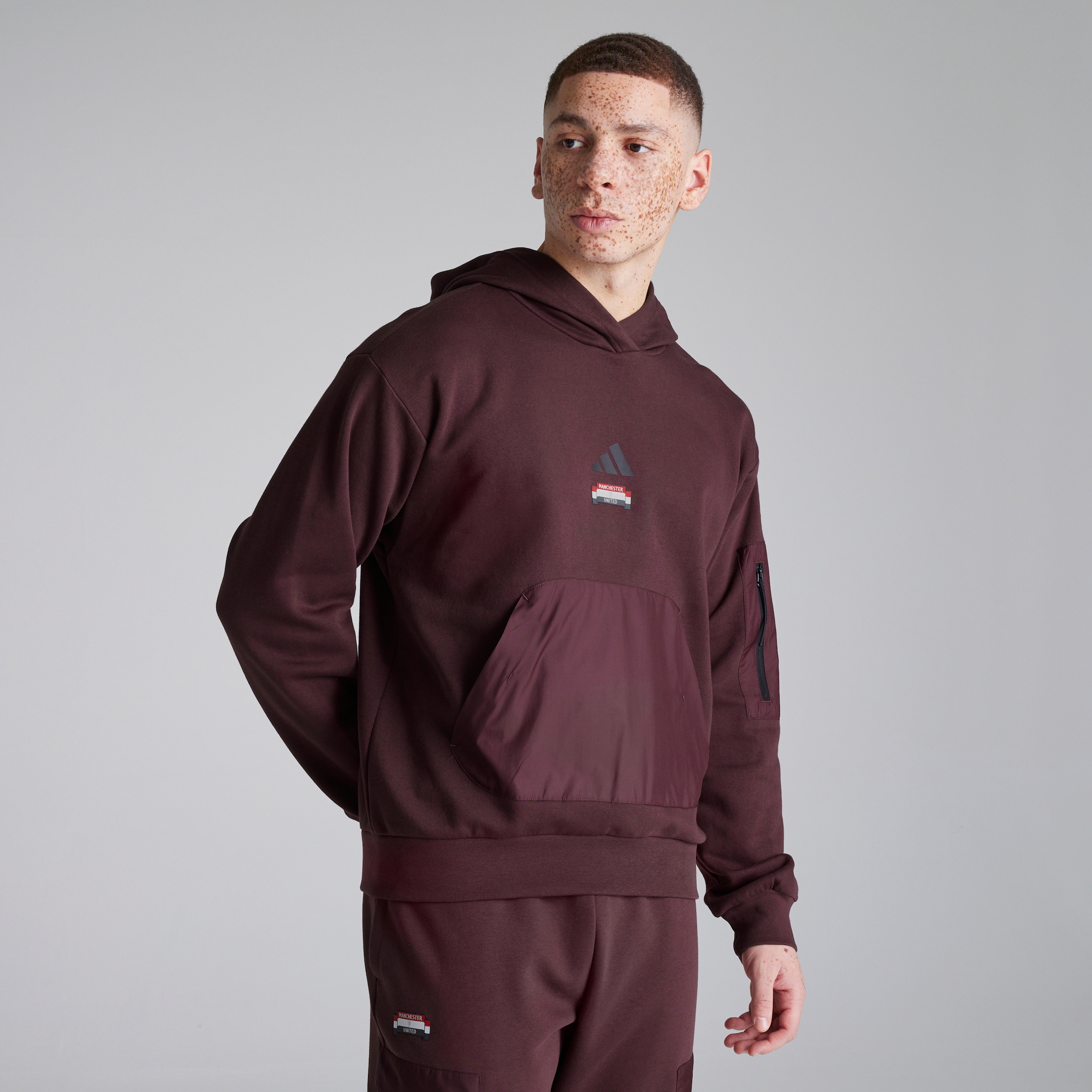 Buy Manchester United x adidas City Escape Fleece Hoodie Red