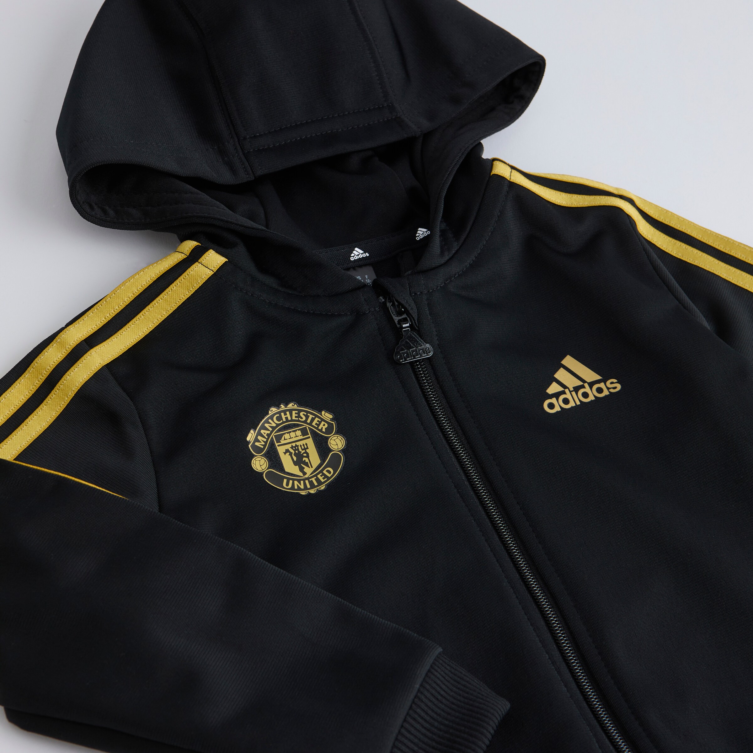 Manchester United x adidas Infant Essentials Shiny Hooded Tracksuit Black Black Detail [3-4]
