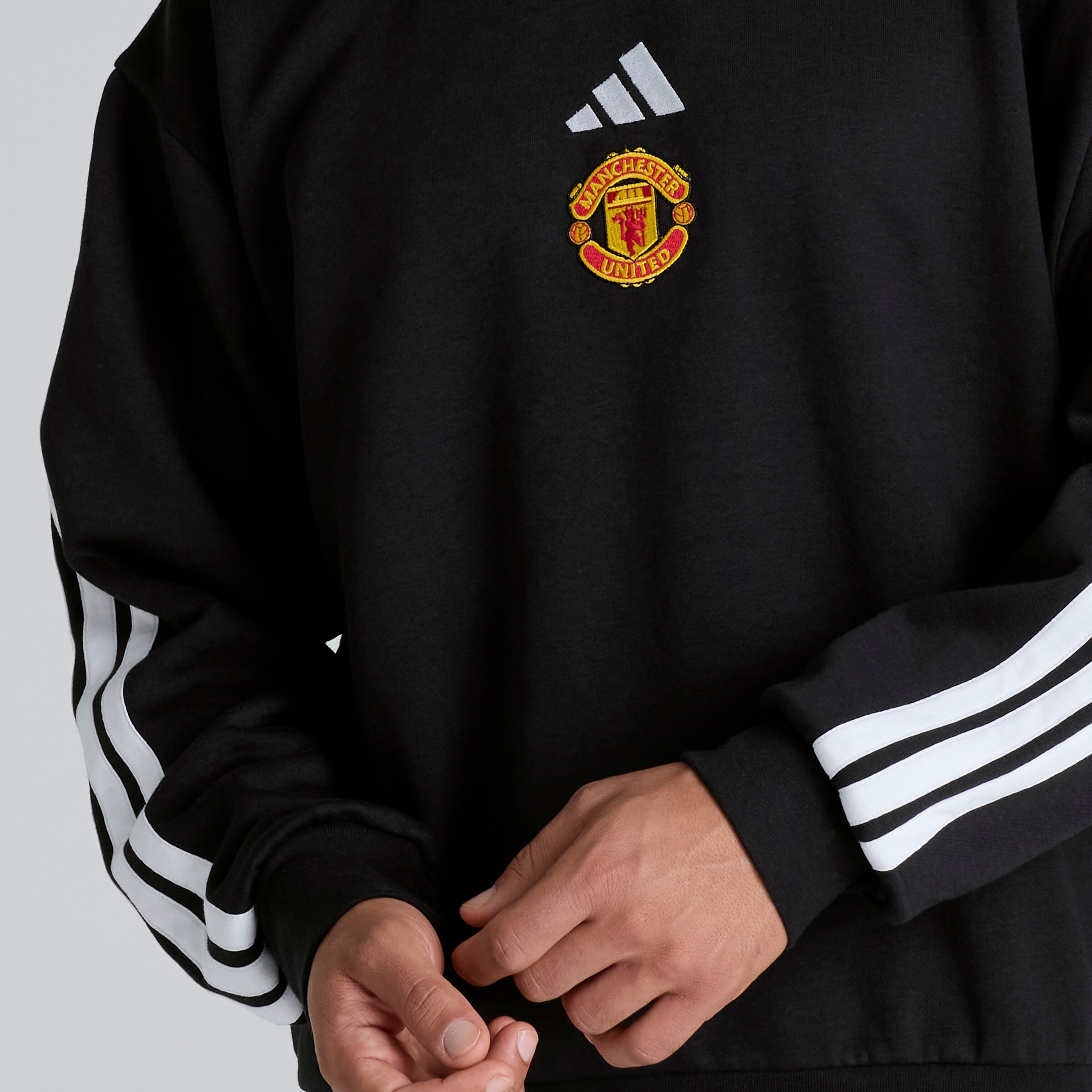 Buy Manchester United x adidas Essentials 3-Stripes Fleece