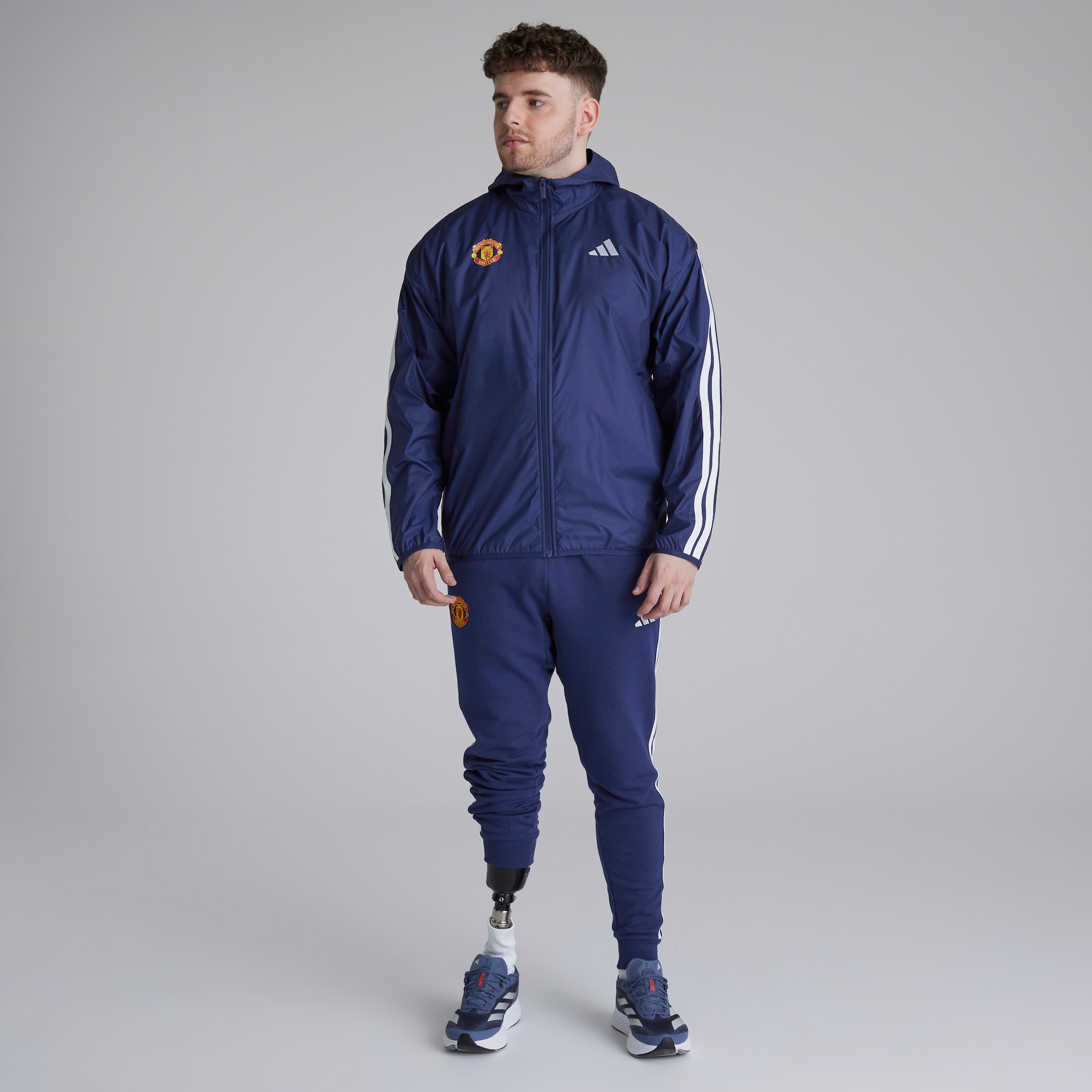 Manchester United x adidas Essentials 3-Stripes Windbreaker Blue Blue Detail [3-5]