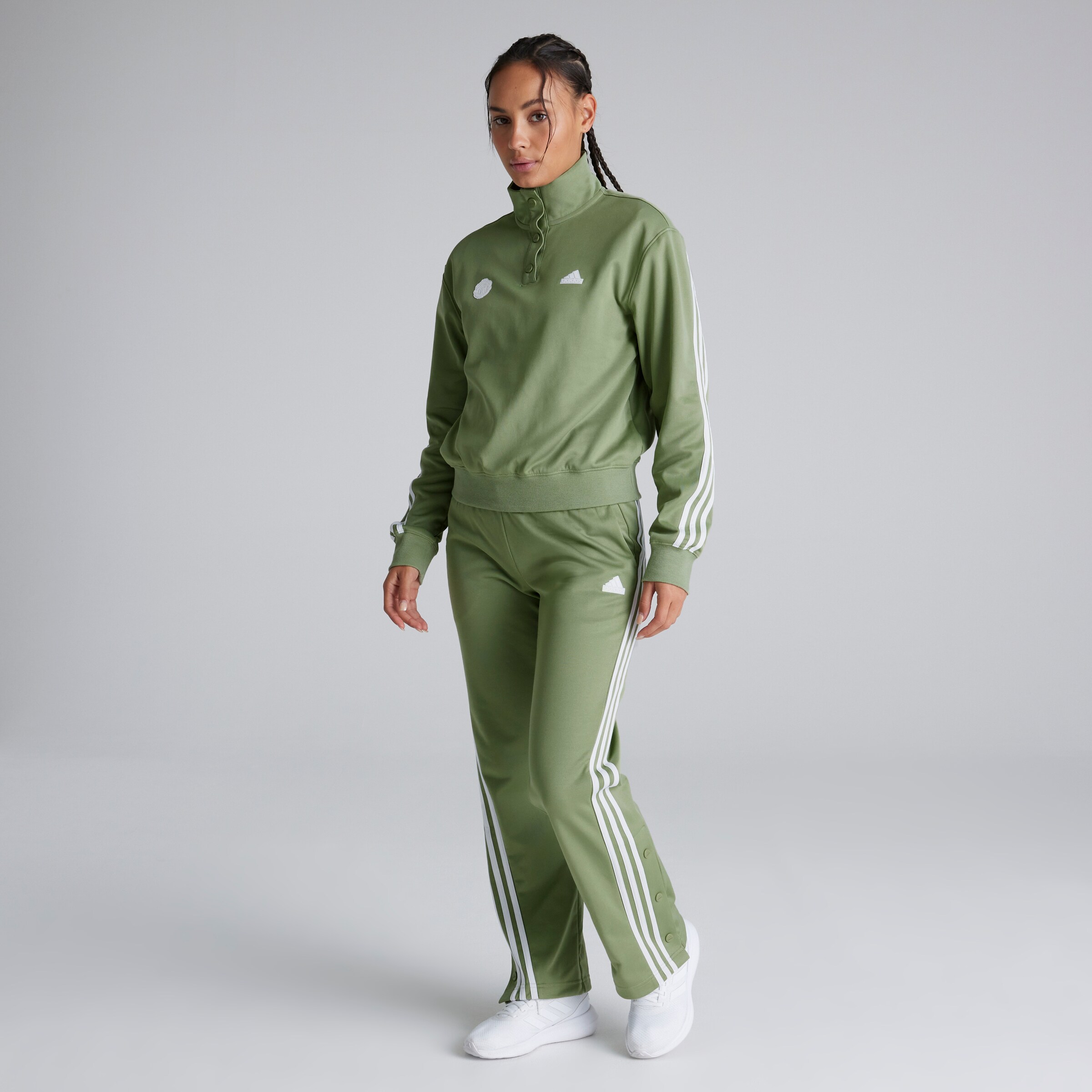 Manchester United x adidas Womens Iconic Wrapping 3-Stripes Snap Joggers Green Green Detail [3-5]