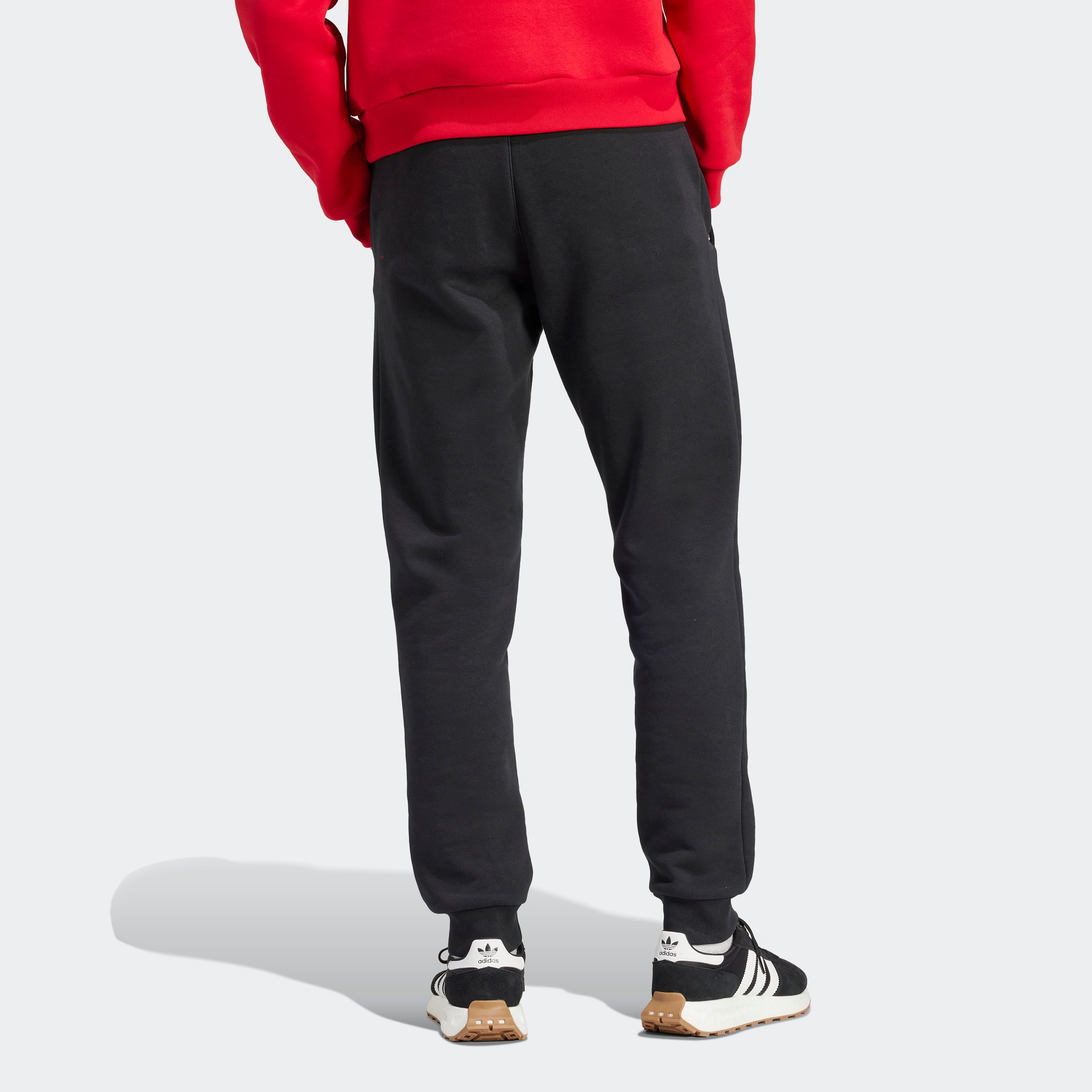 Buy Manchester United Essentials Trefoil Tracksuit Bottoms