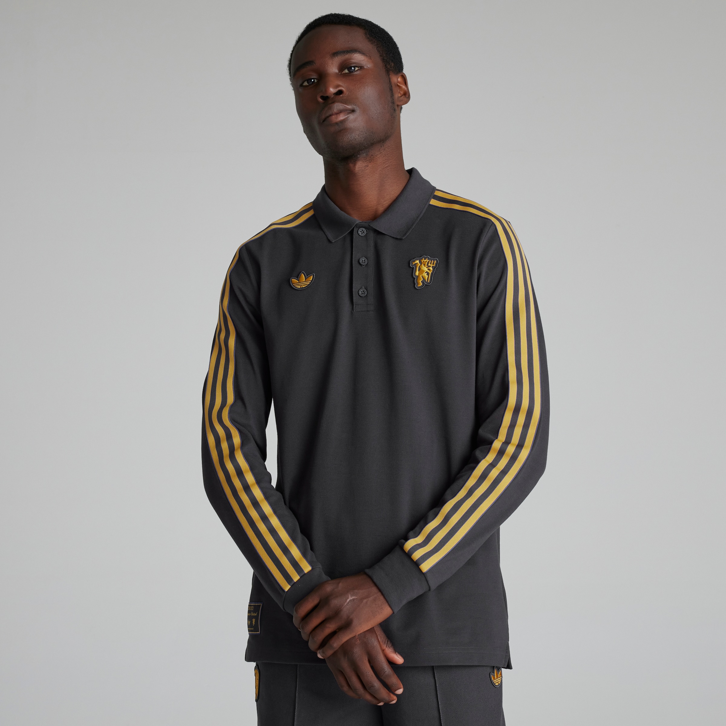 Buy Manchester United Terrace Icons Long Sleeve Polo Shirt