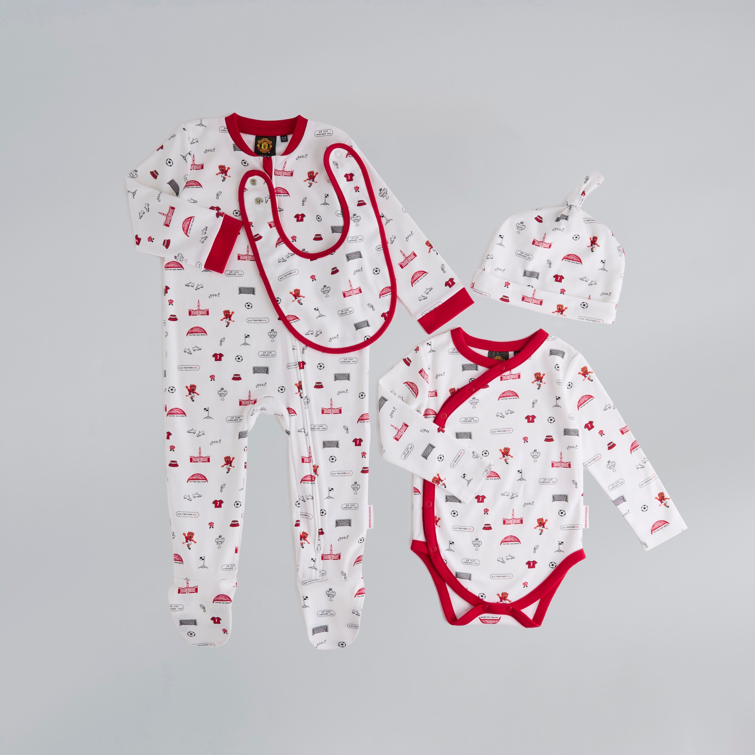 Manchester United Baby Ditsy Print Sleepsuit, Bodysuit, Bib & Hat Gift Bag Set White Multi
