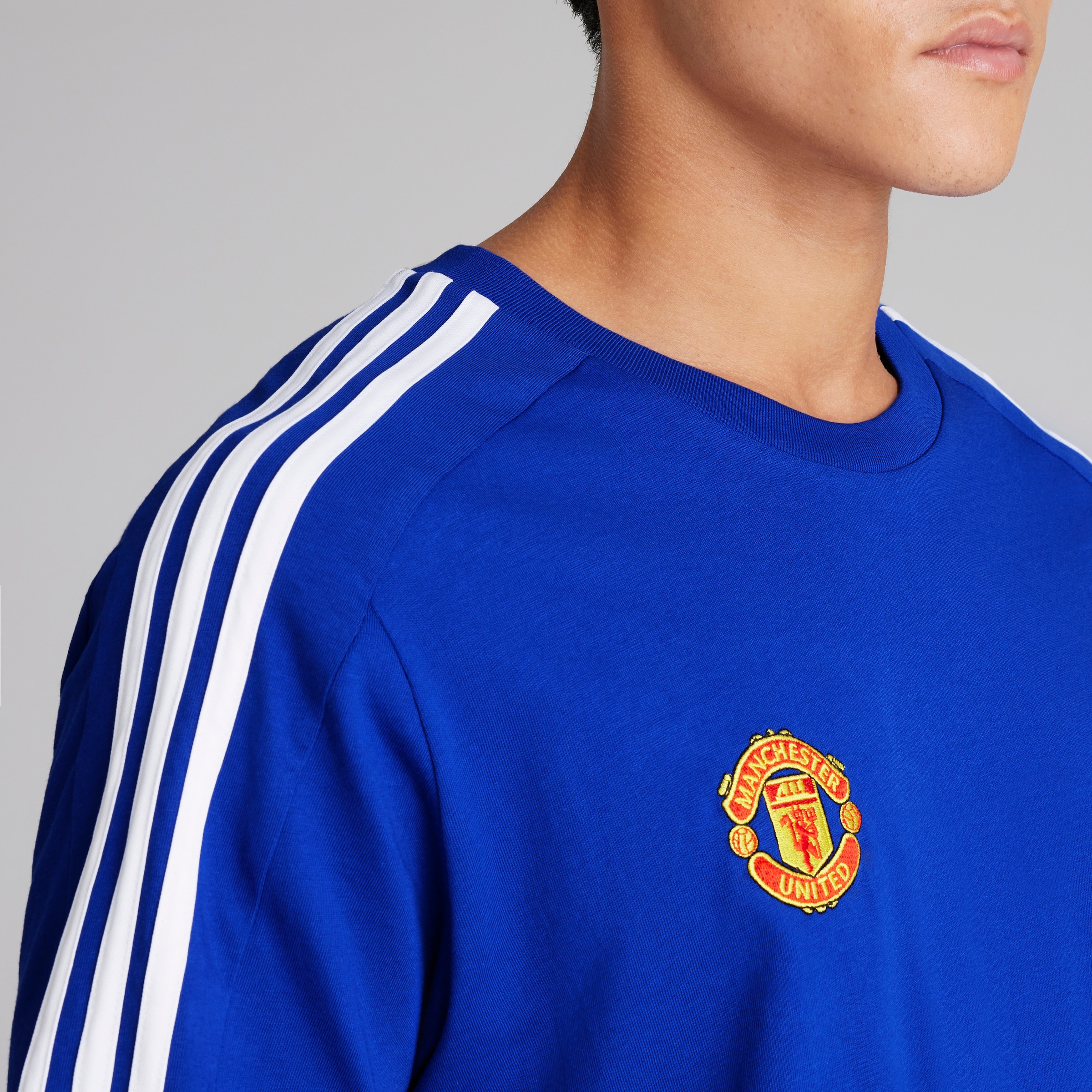 Buy Manchester United x adidas Essentials Single Jersey 3