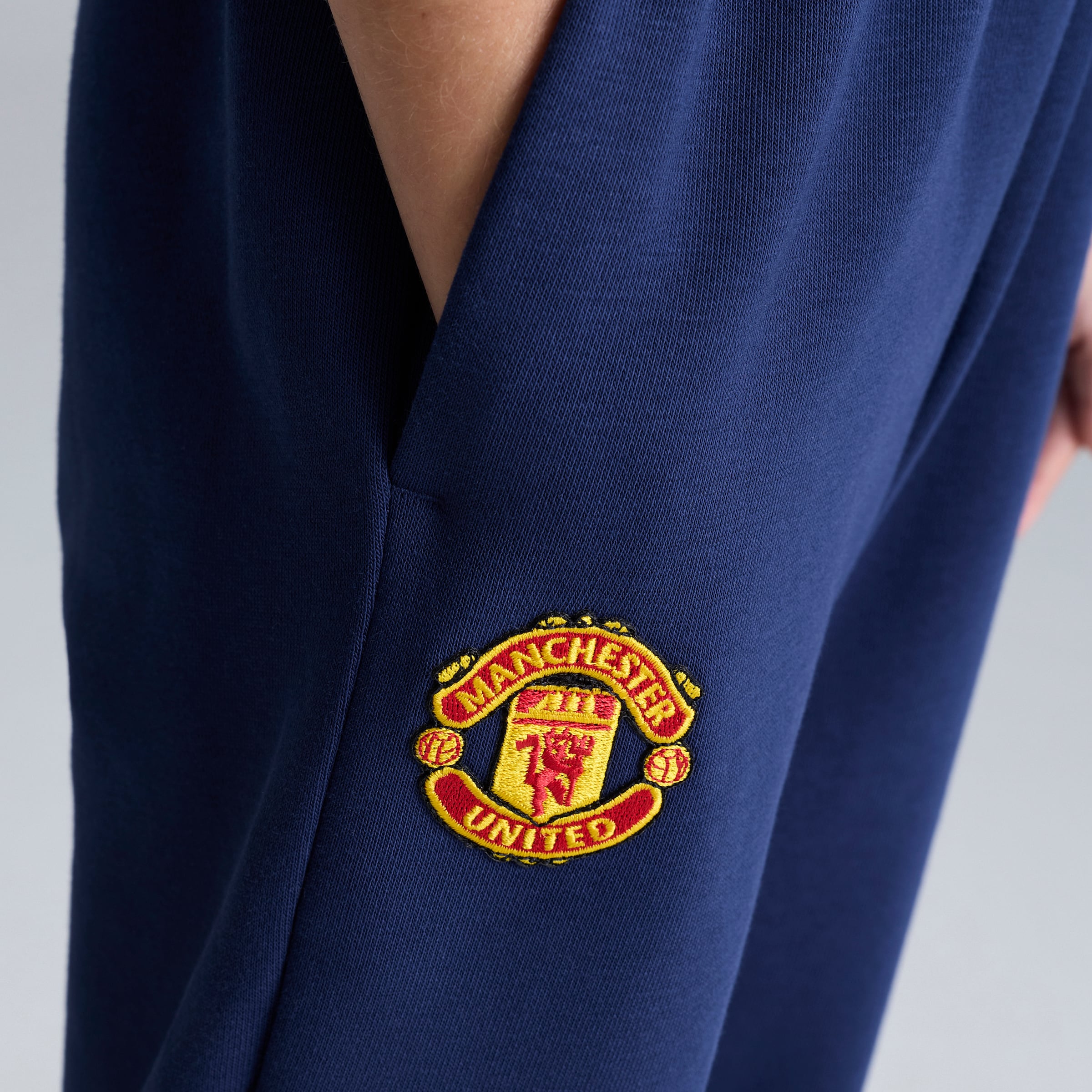 Manchester United x adidas Kids Essentials French Terry Tracksuit Blue Blue Detail [6-6]