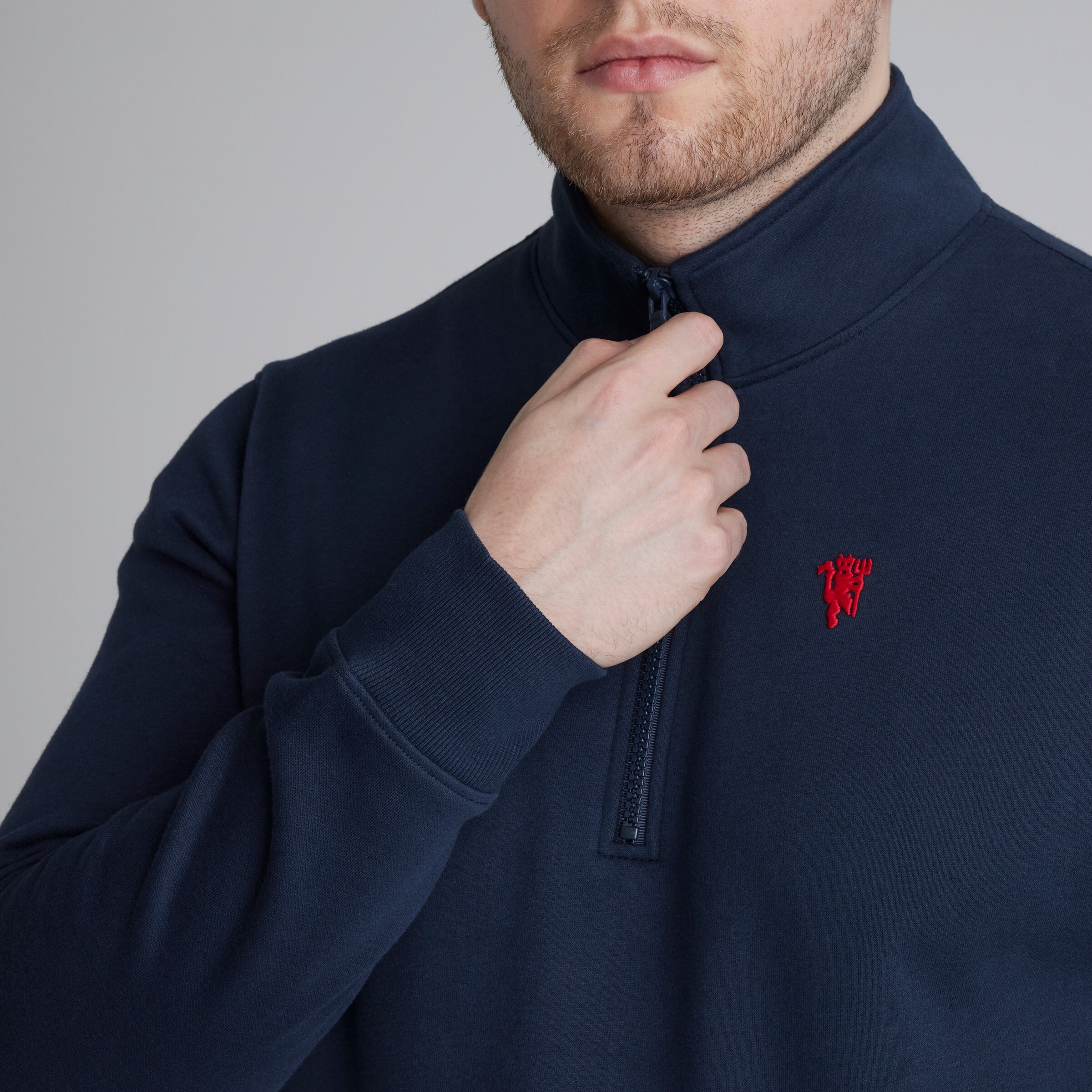 Buy Manchester United Devil Essentials 1/4 Zip Sweatshirt