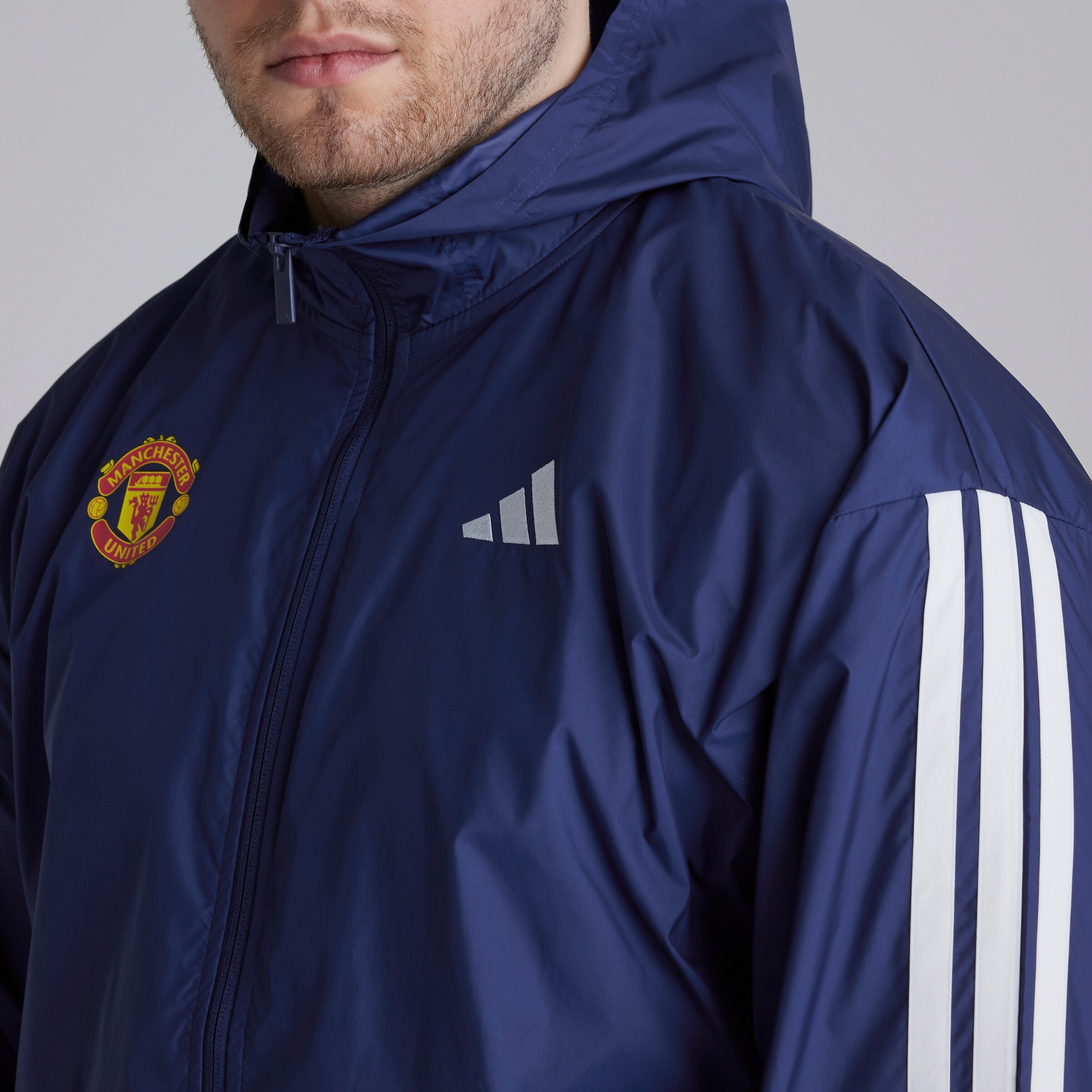 Manchester United x adidas Essentials 3-Stripes Windbreaker Blue Blue Detail [4-5]