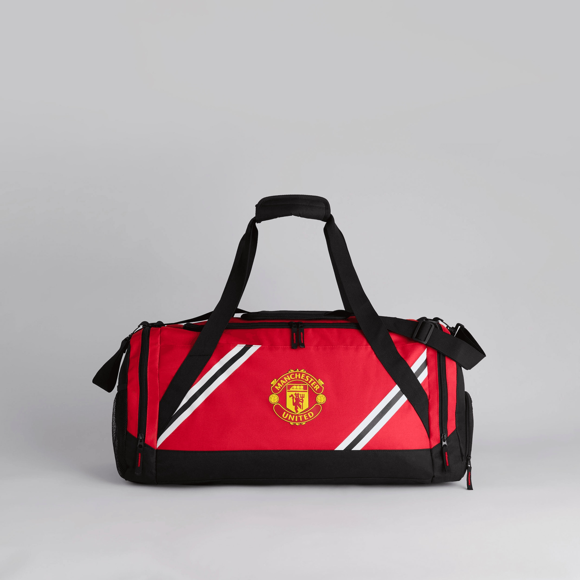 Buy Manchester United Core Stripe Duffle Red Manchester United Store