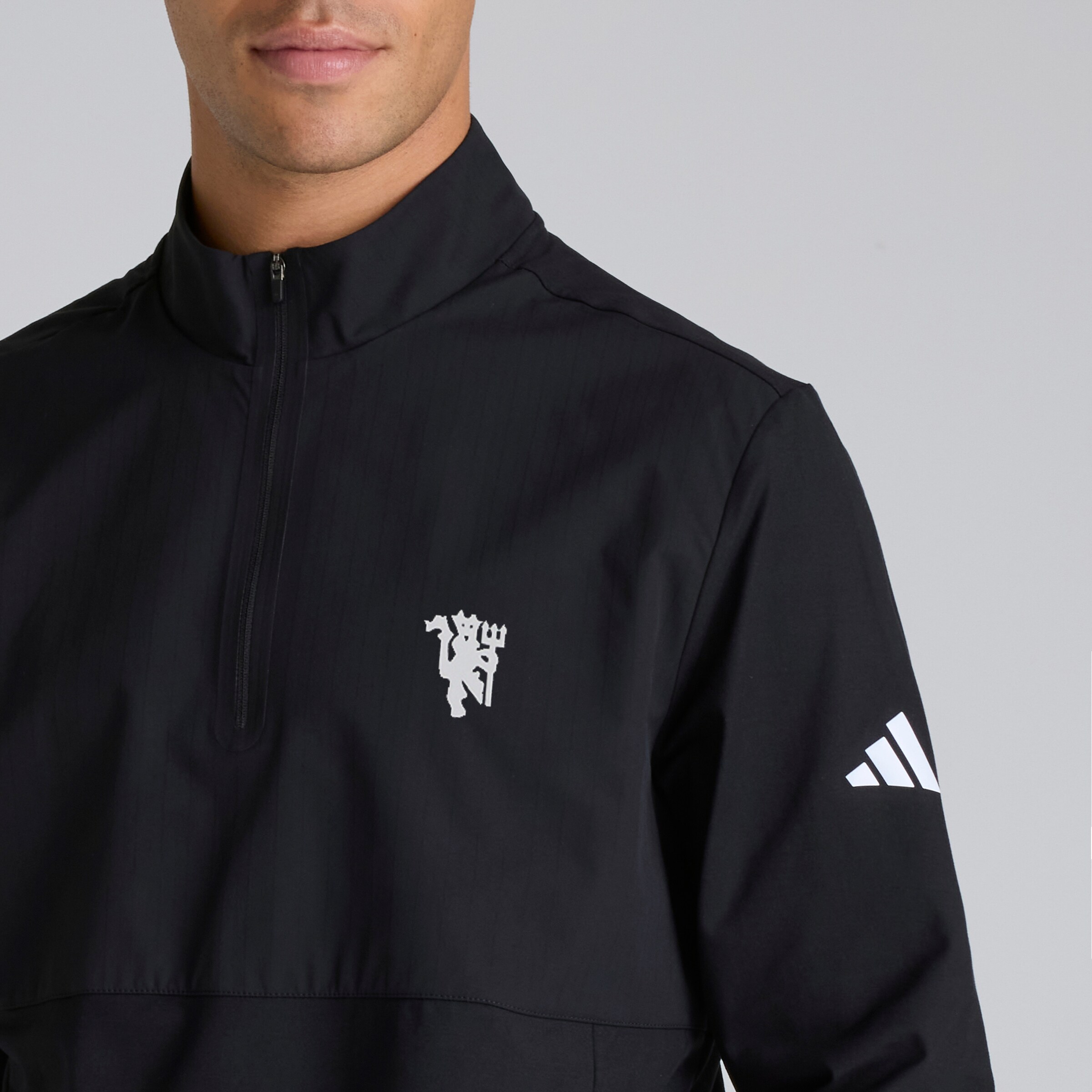 Manchester United x adidas Golf Ultimate365 Tour 1/4-Zip Sweatshirt Black Black Detail [4-5]