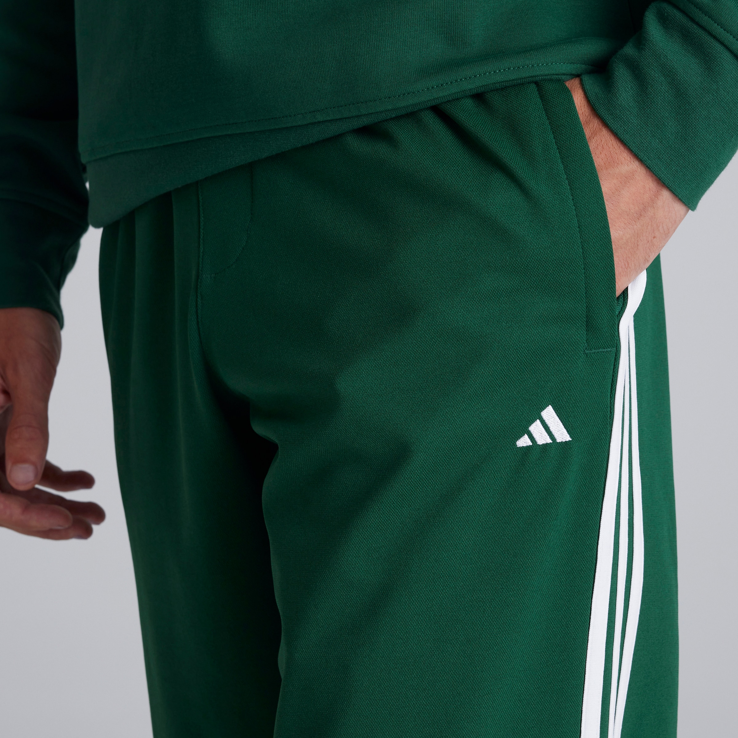 Adidas light green track pants best sale