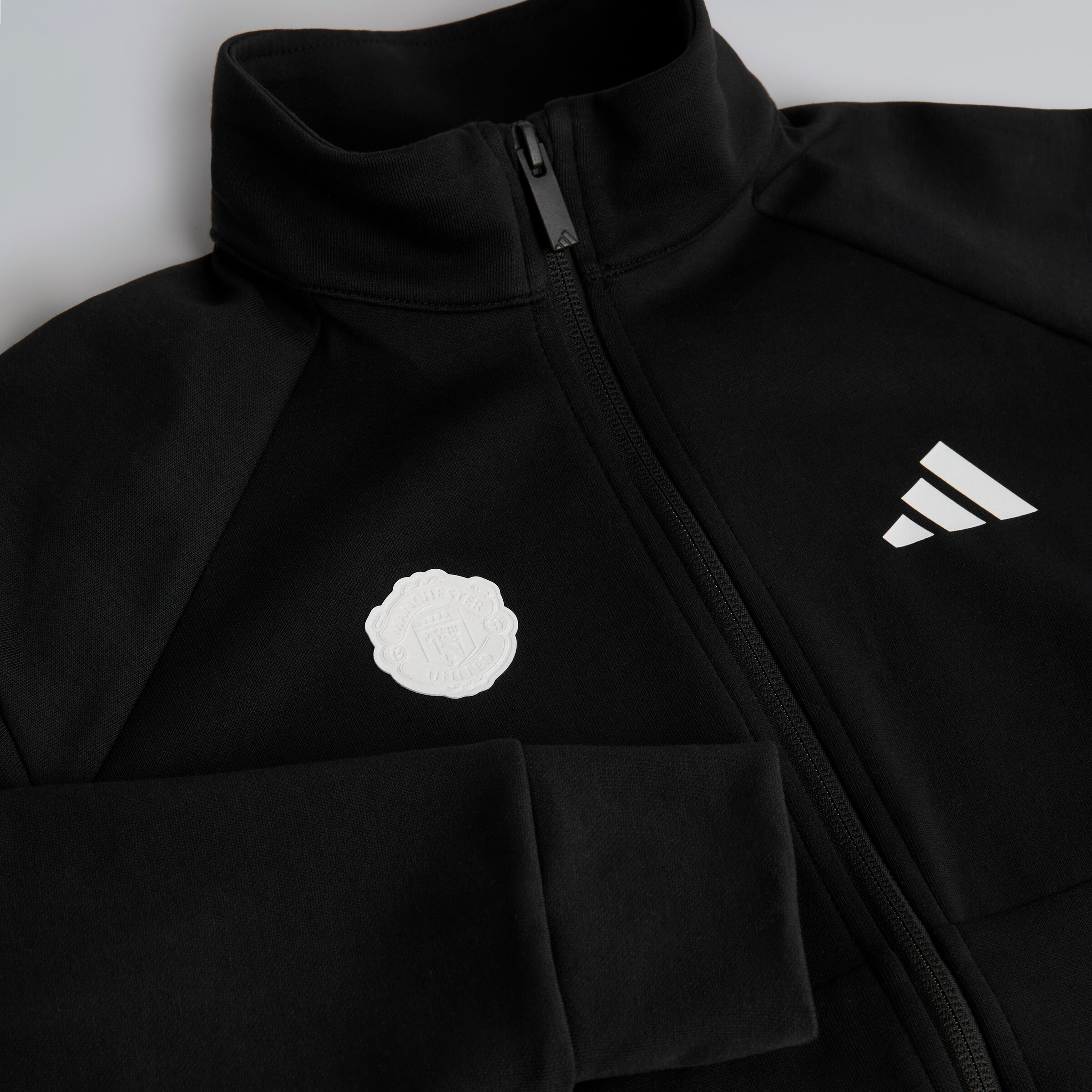 Manchester United x adidas Kids Future Icons Tracksuit Black Black Detail [3-4]