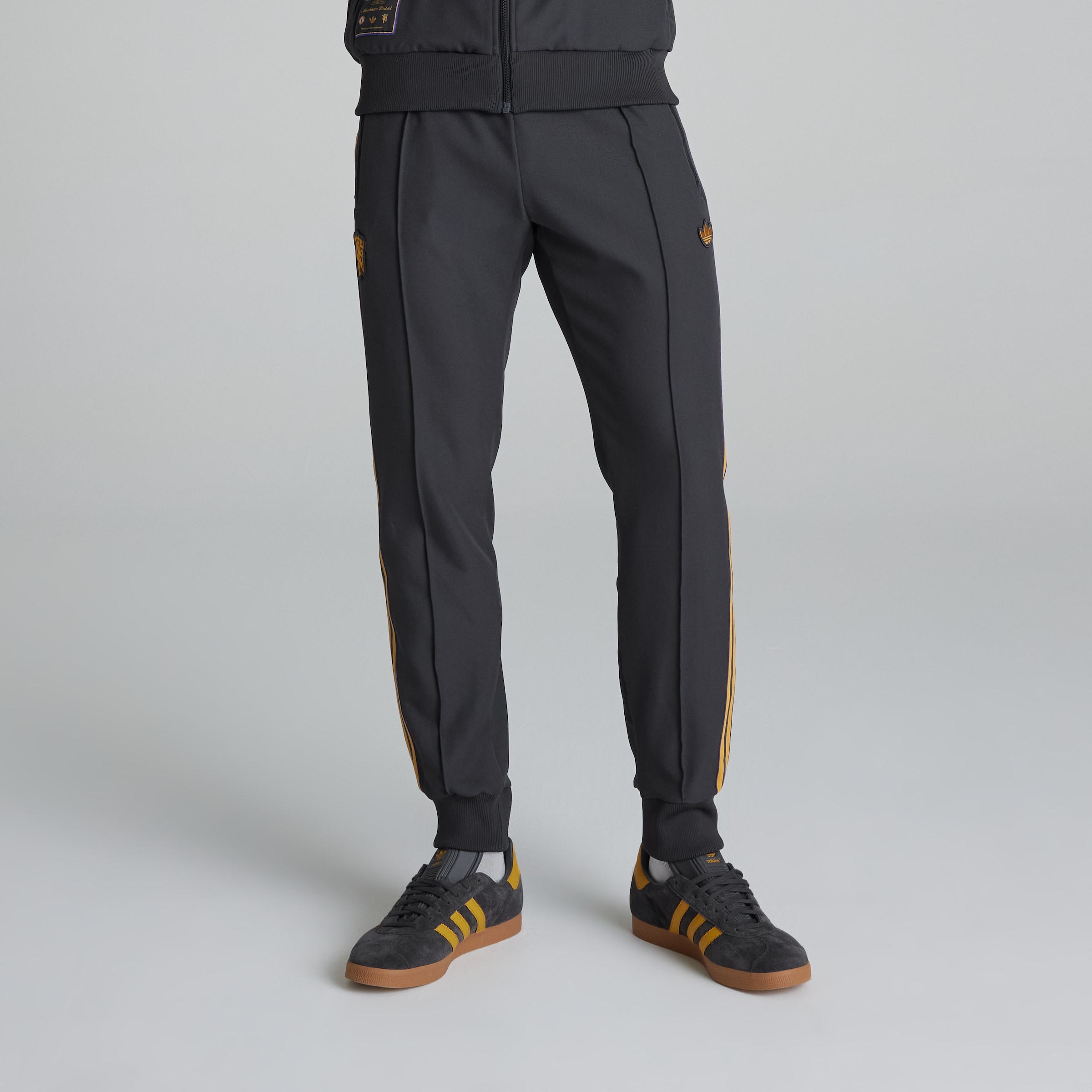 Buy Manchester United Terrace Icons Track Pants | Manchester