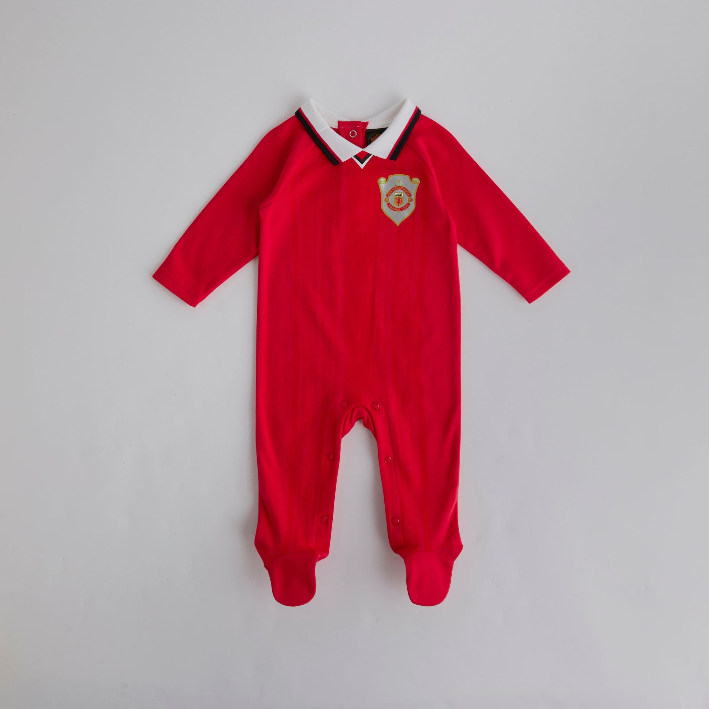 Manchester United Baby 1999 Retro Champions League Sleepsuit Red Red Detail [2-6]