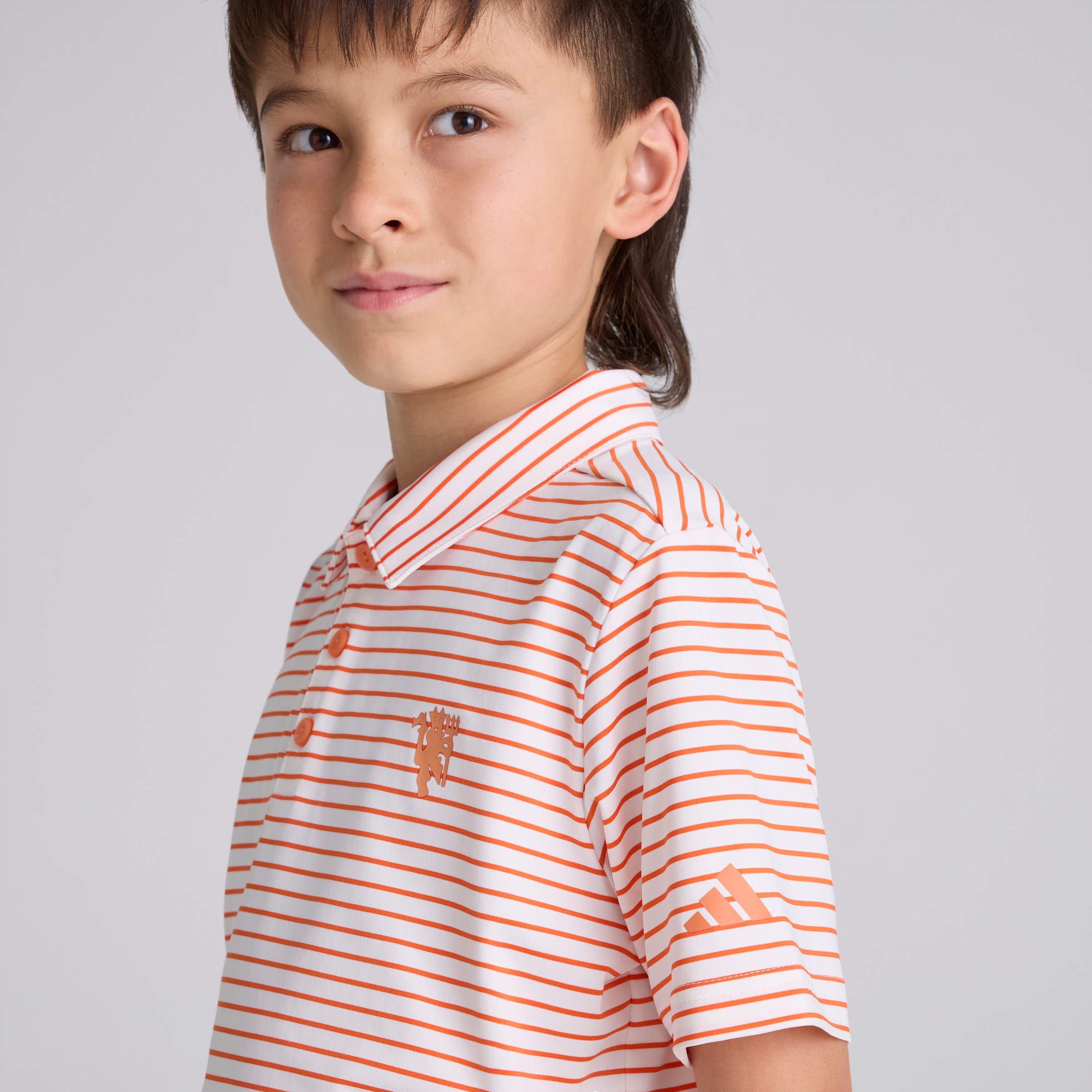 Manchester United x adidas Kids Golf Striped Polo Shirt Orange Orange Detail [4-5]