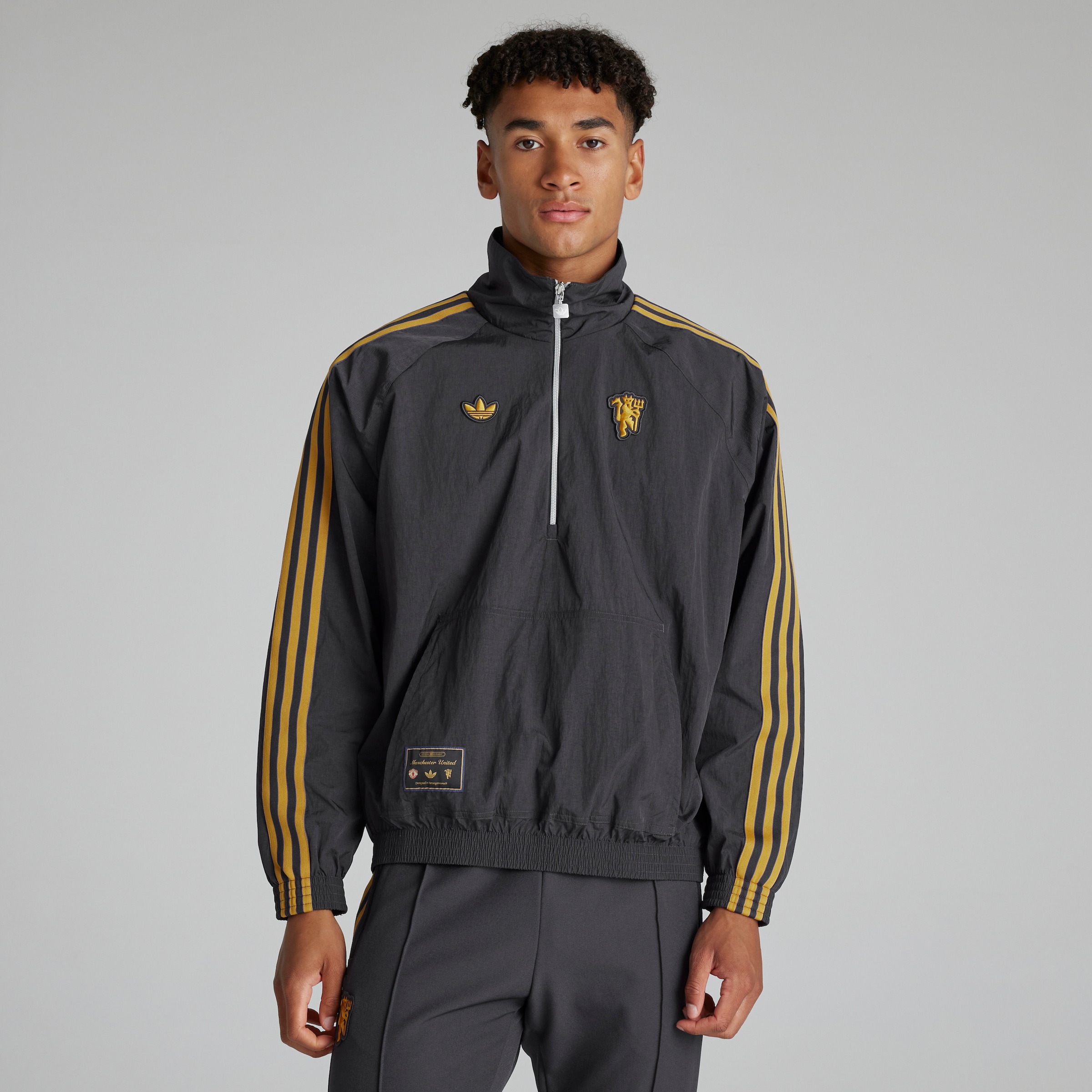 Buy Manchester United x adidas Golf Elevated 1/4 Zip