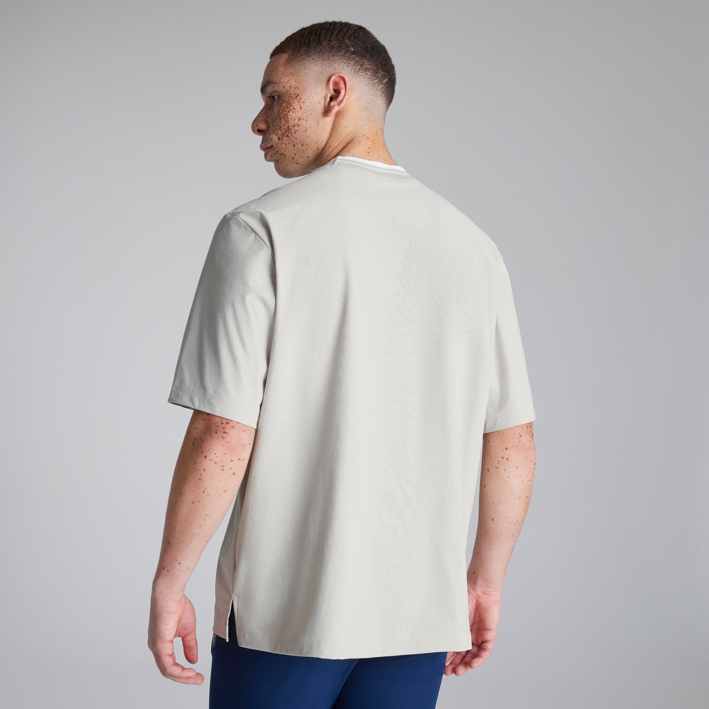 Manchester United x adidas Golf Beyond Mock Polo Shirt Beige Detail [2-5]