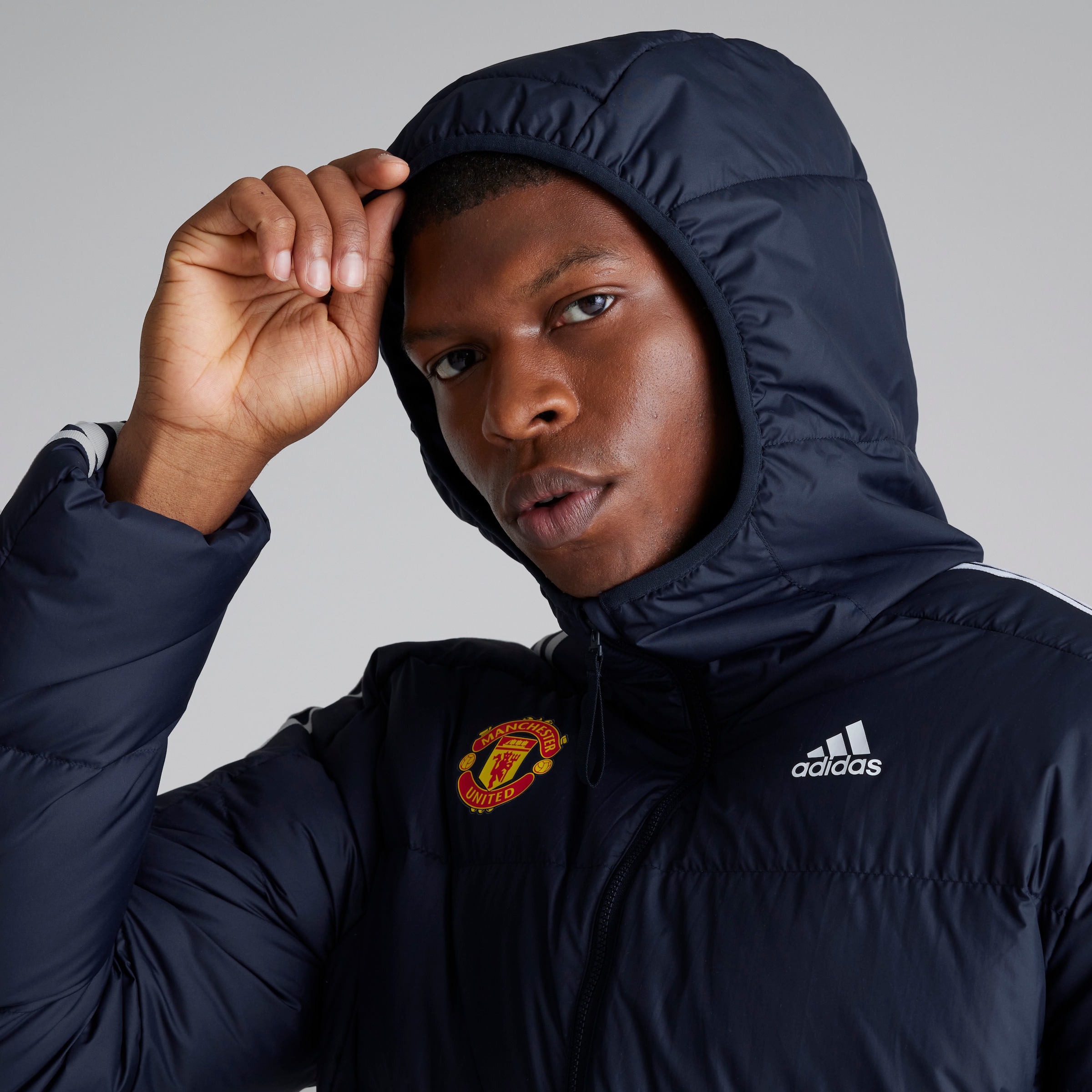 Buy Manchester United x adidas Essentials Midweight Down Hooded