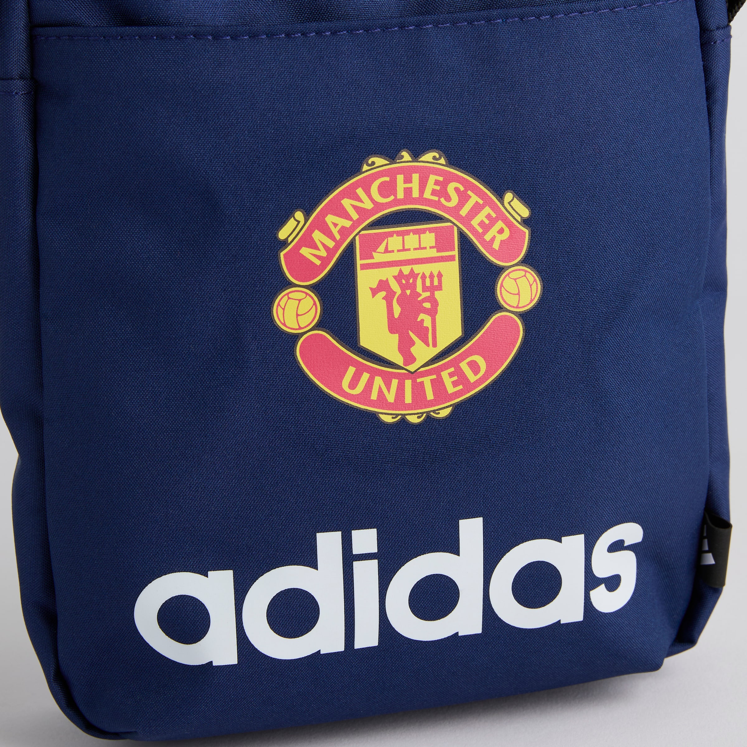 Manchester United x adidas Essentials Linear Organiser Blue Blue Detail [3-4]
