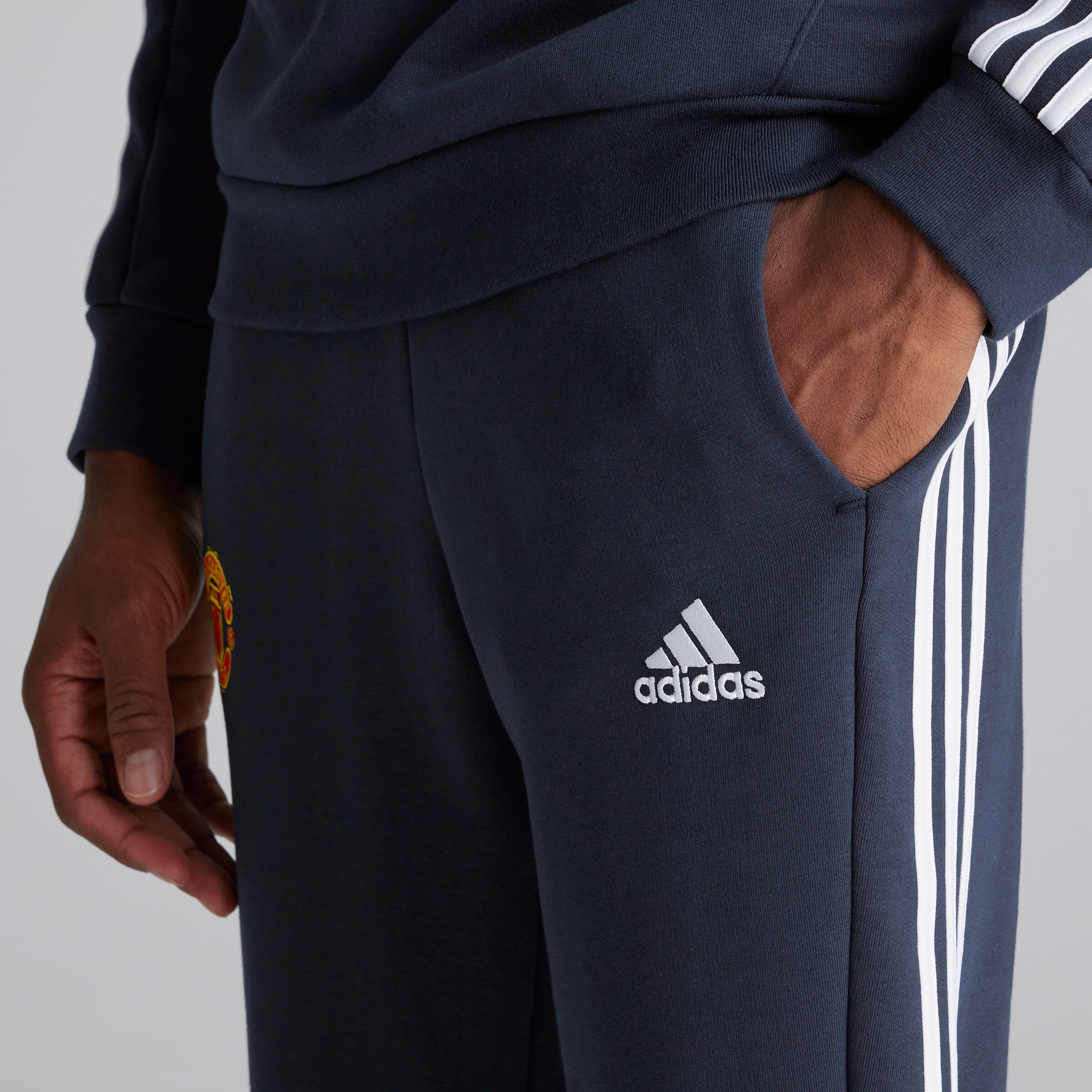 Manchester United x adidas Mens Essentials Fleece 3-Stripes Tapered Joggers Navy Navy blue Detail [4-5]