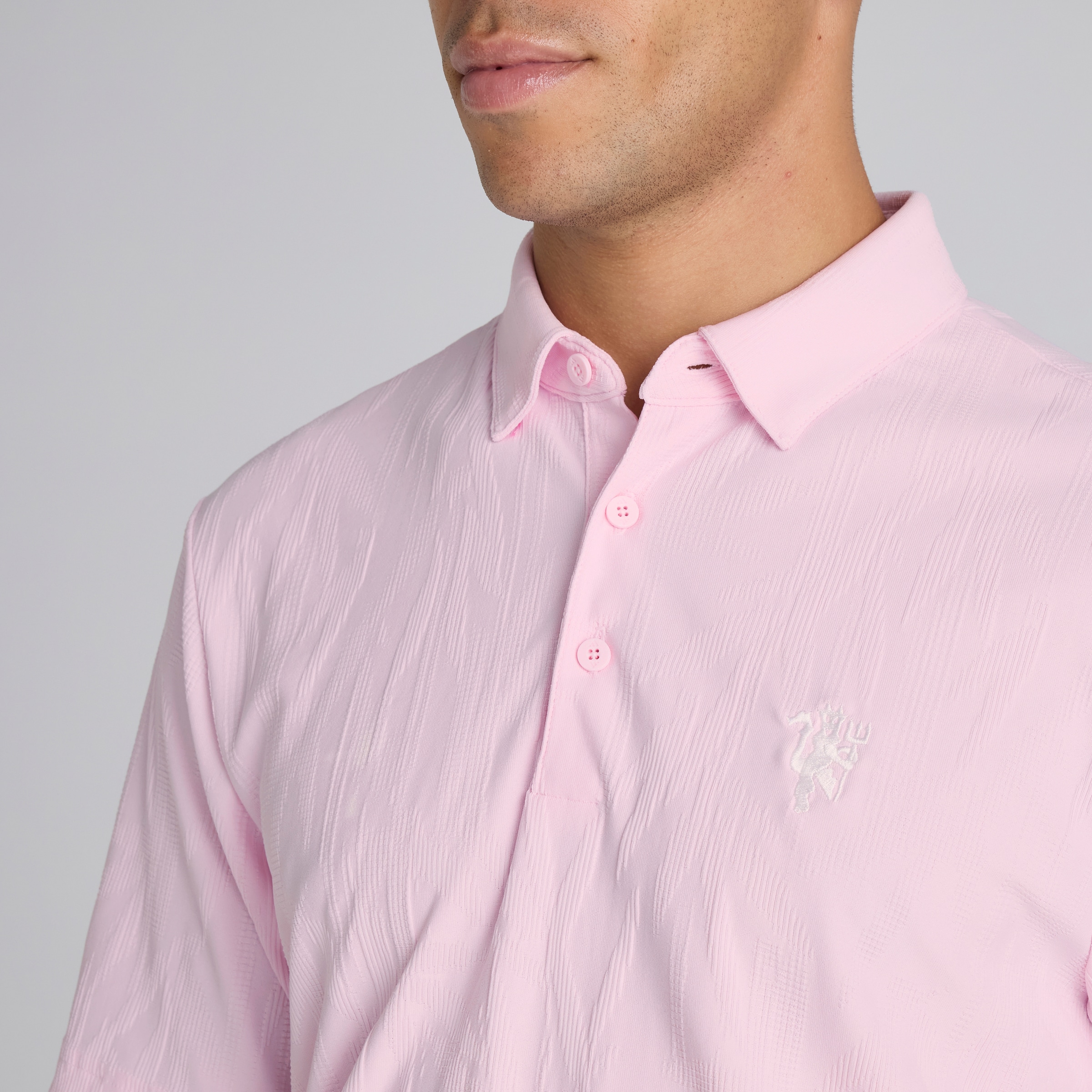 Manchester United x adidas Golf Go-To Textured Polo Shirt Pink Pink Detail [5-5]