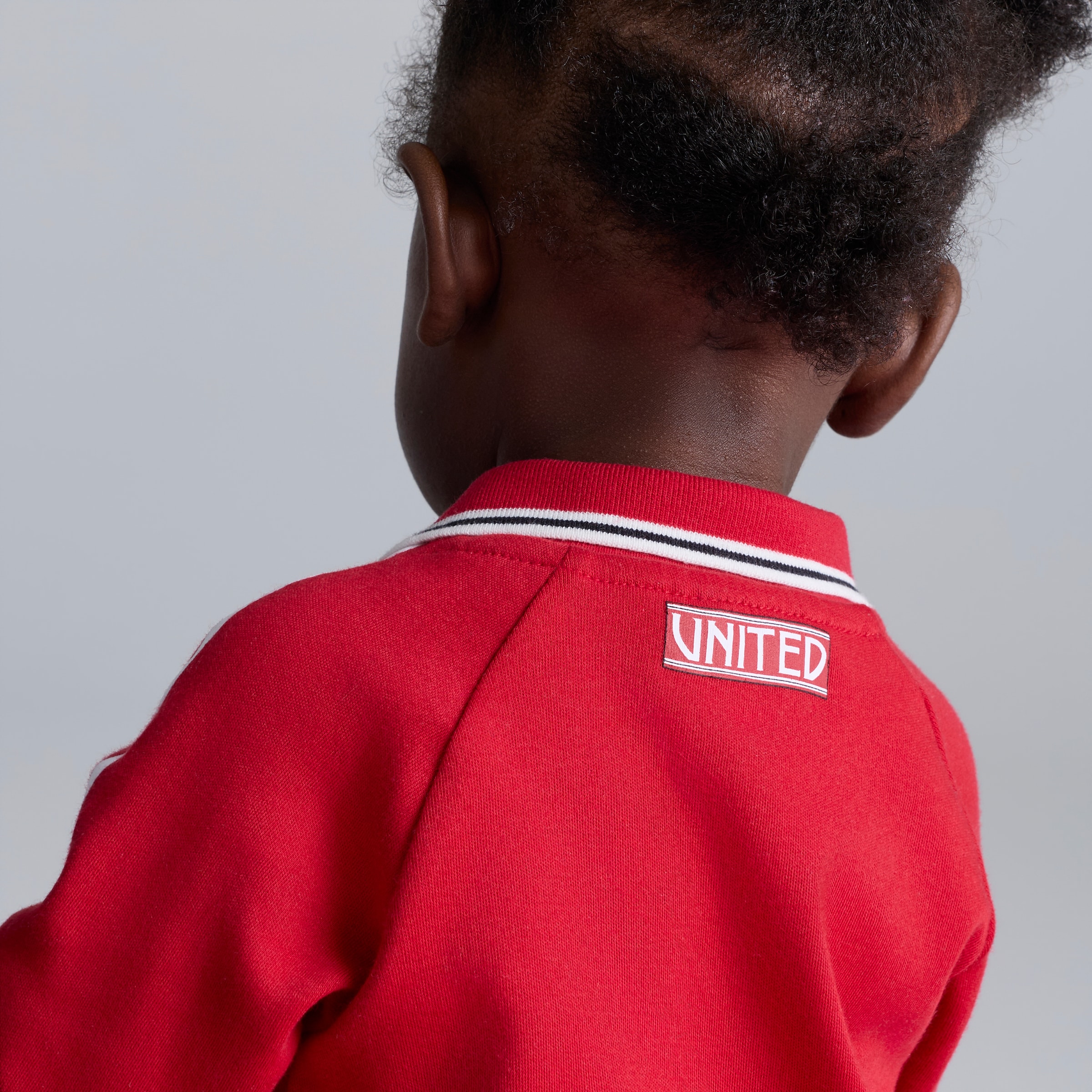 Manchester United Baby 26/27 Home Sleepsuit Red Red Detail [4-5]