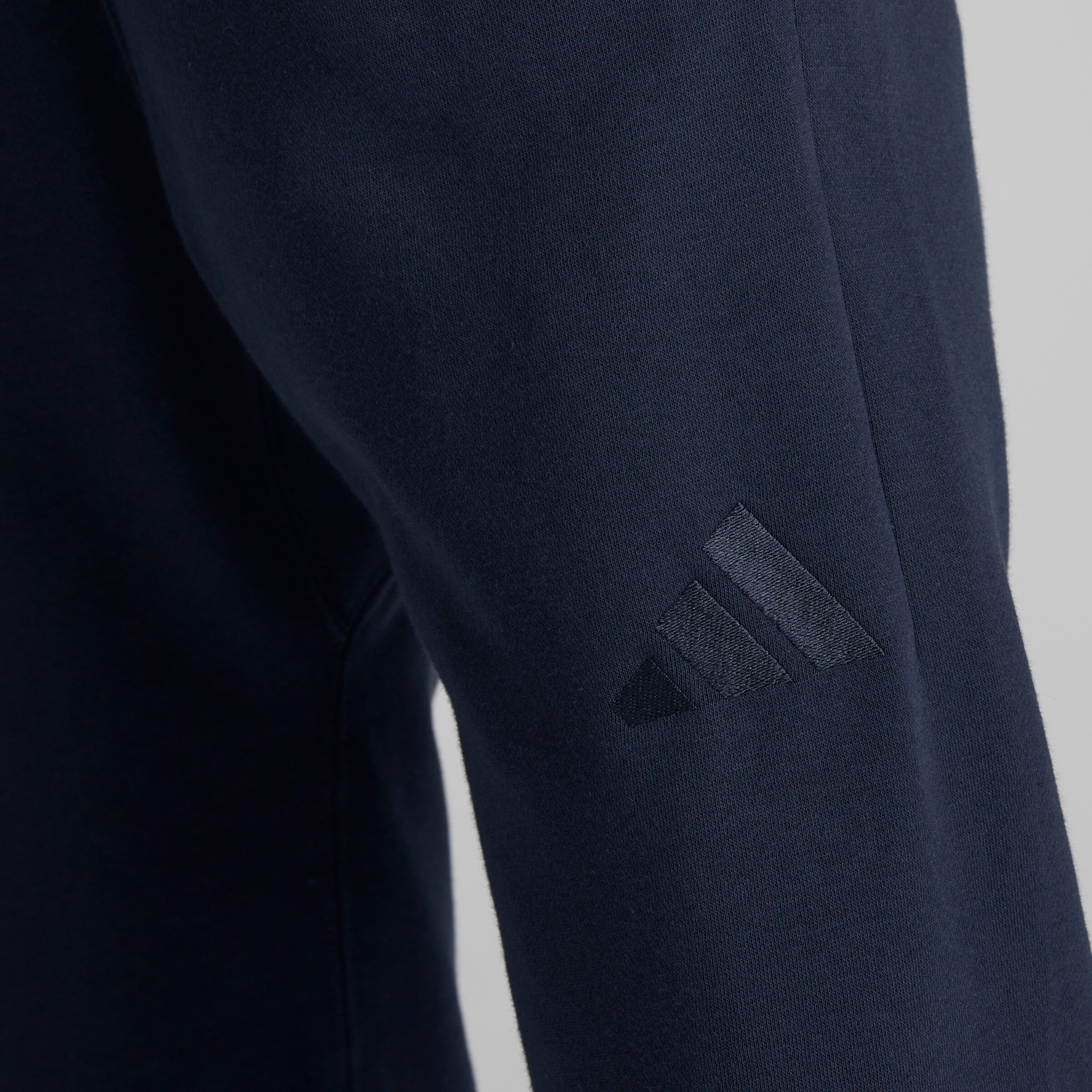 Manchester United x adidas ALL SZN Fleece Regular Tapered Joggers Navy Detail [4-6]
