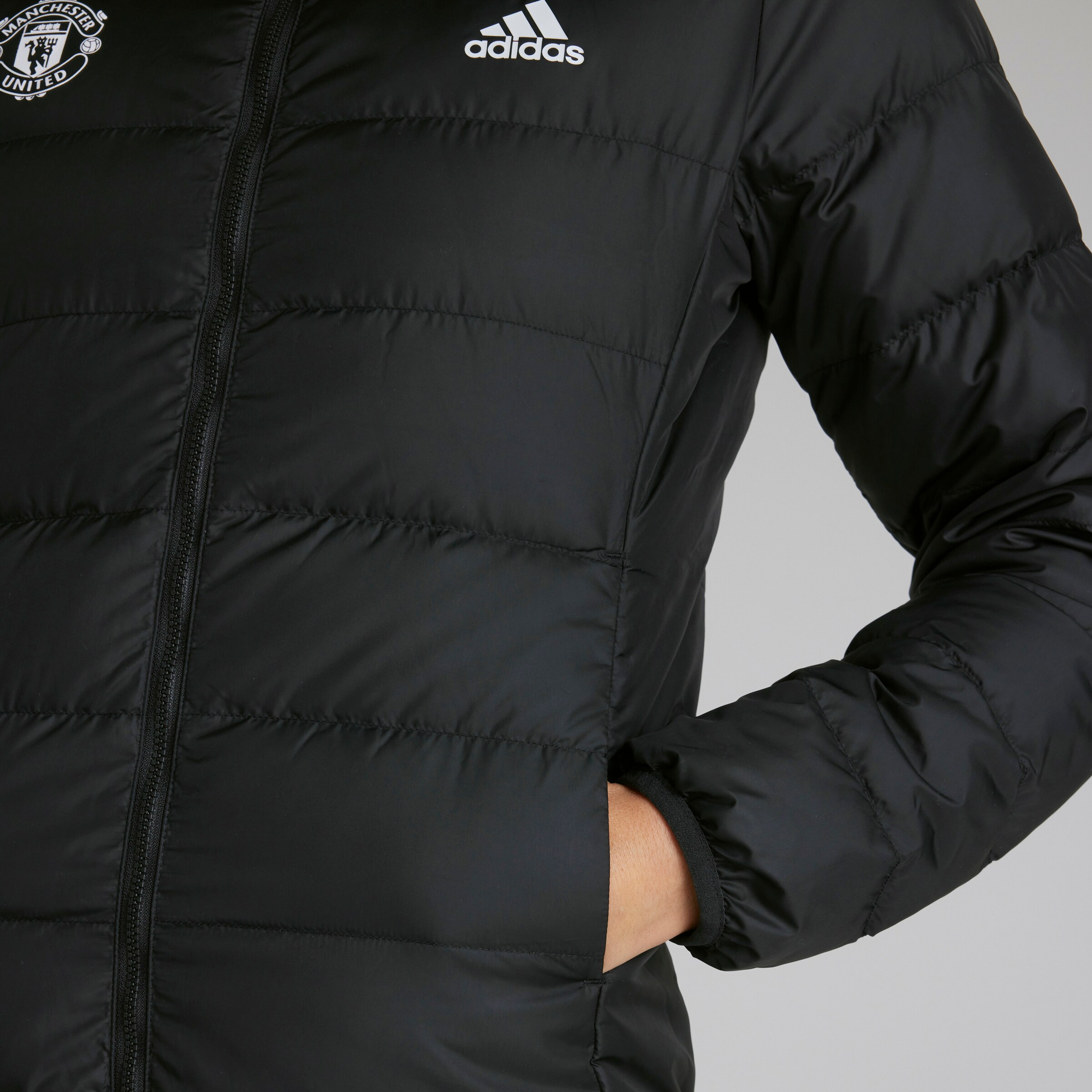 Buy Manchester United x adidas Womens Essentials Light Down Hooded Jacket Black Manchester United Store