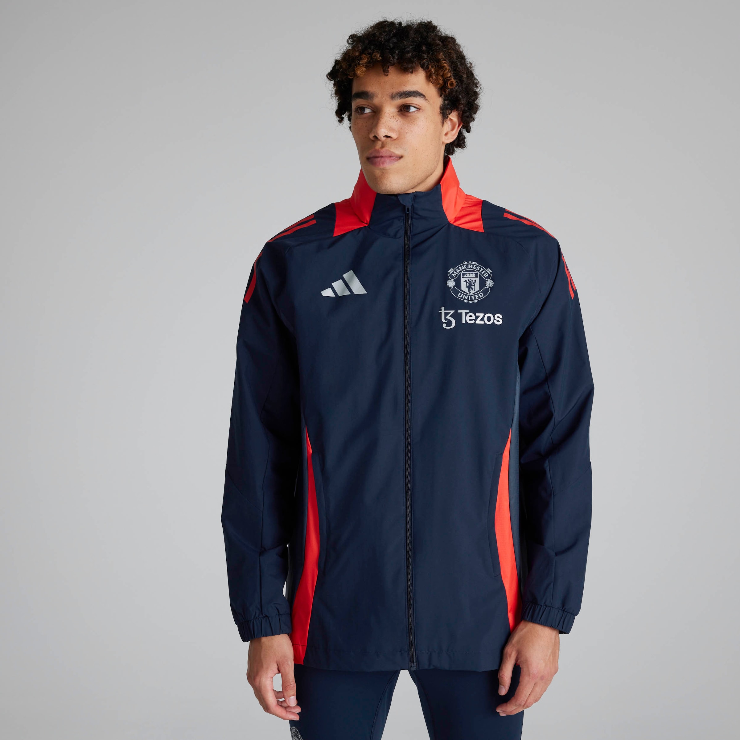 Buy Manchester United Tiro 24 All-Weather Jacket Navy Manchester