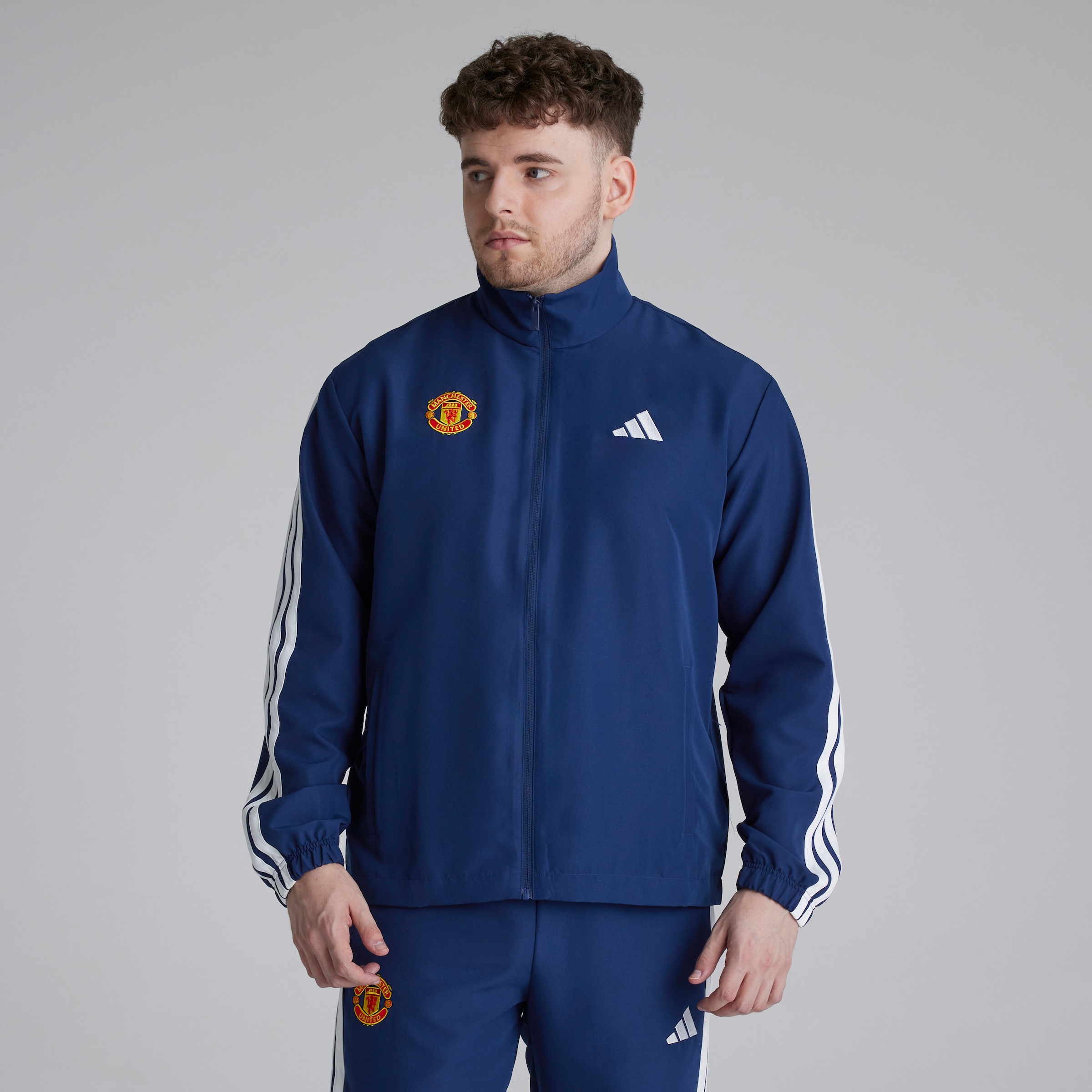 Manchester United x adidas Essentials 3-Stripes Woven Tracksuit Blue Bleu Détail [3-6]