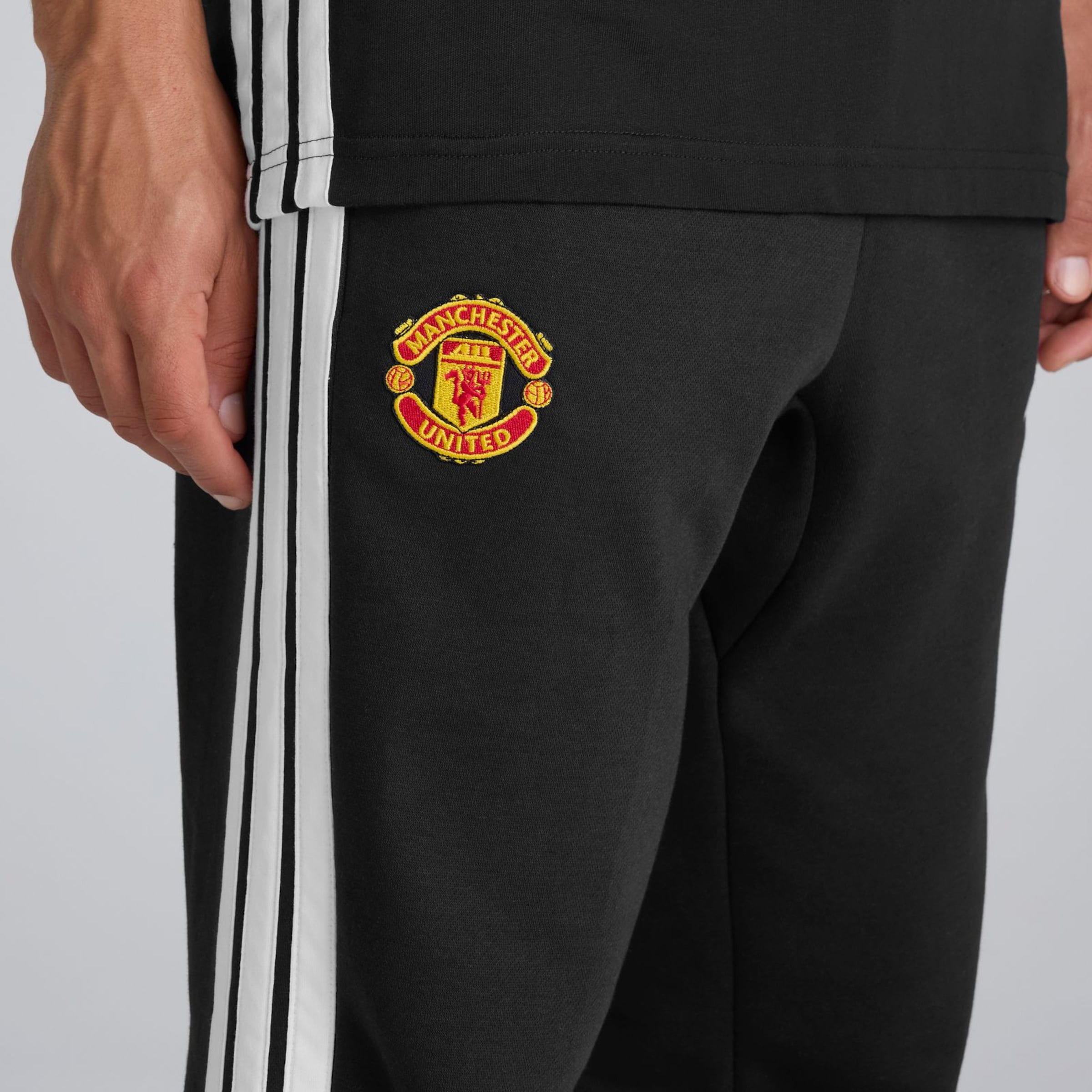 Manchester United x adidas Essentials 3-Stripes Fleece Joggers Black Black Detail [5-6]