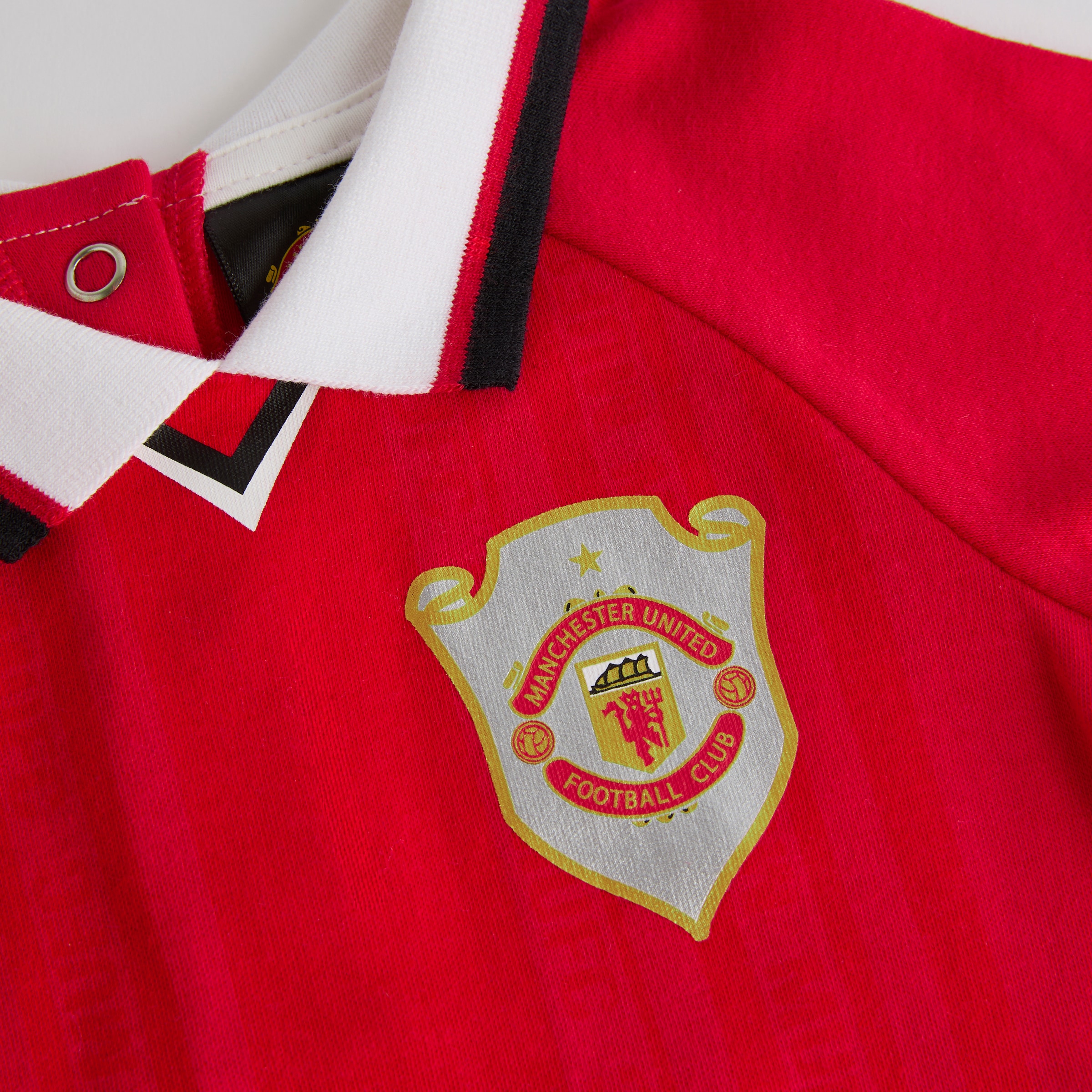Manchester United Baby 1999 Retro Champions League Sleepsuit Red Red Detail [4-4]