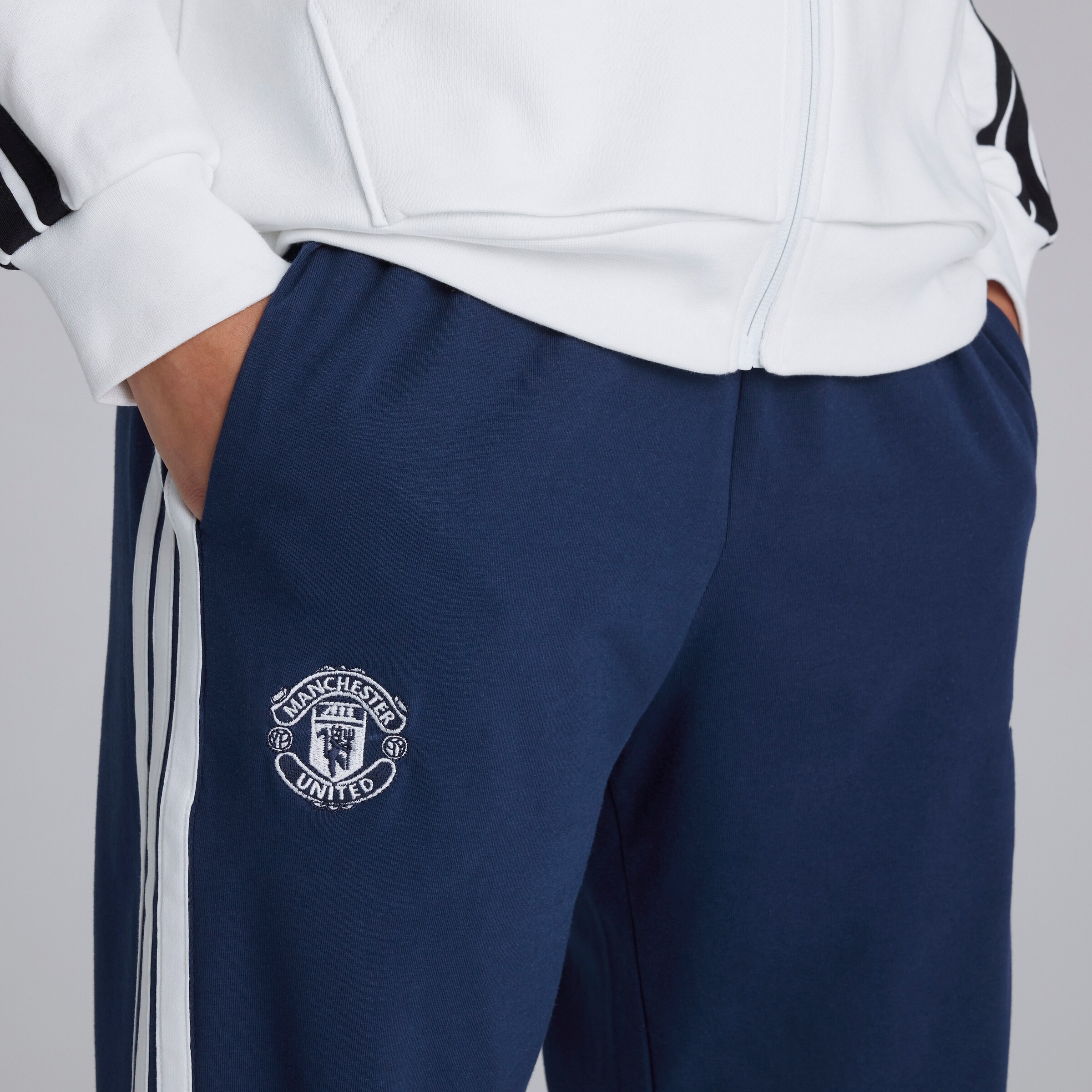 Manchester United x adidas Womens Essentials 3-Stripes Joggers Blue Blue Detail [5-6]