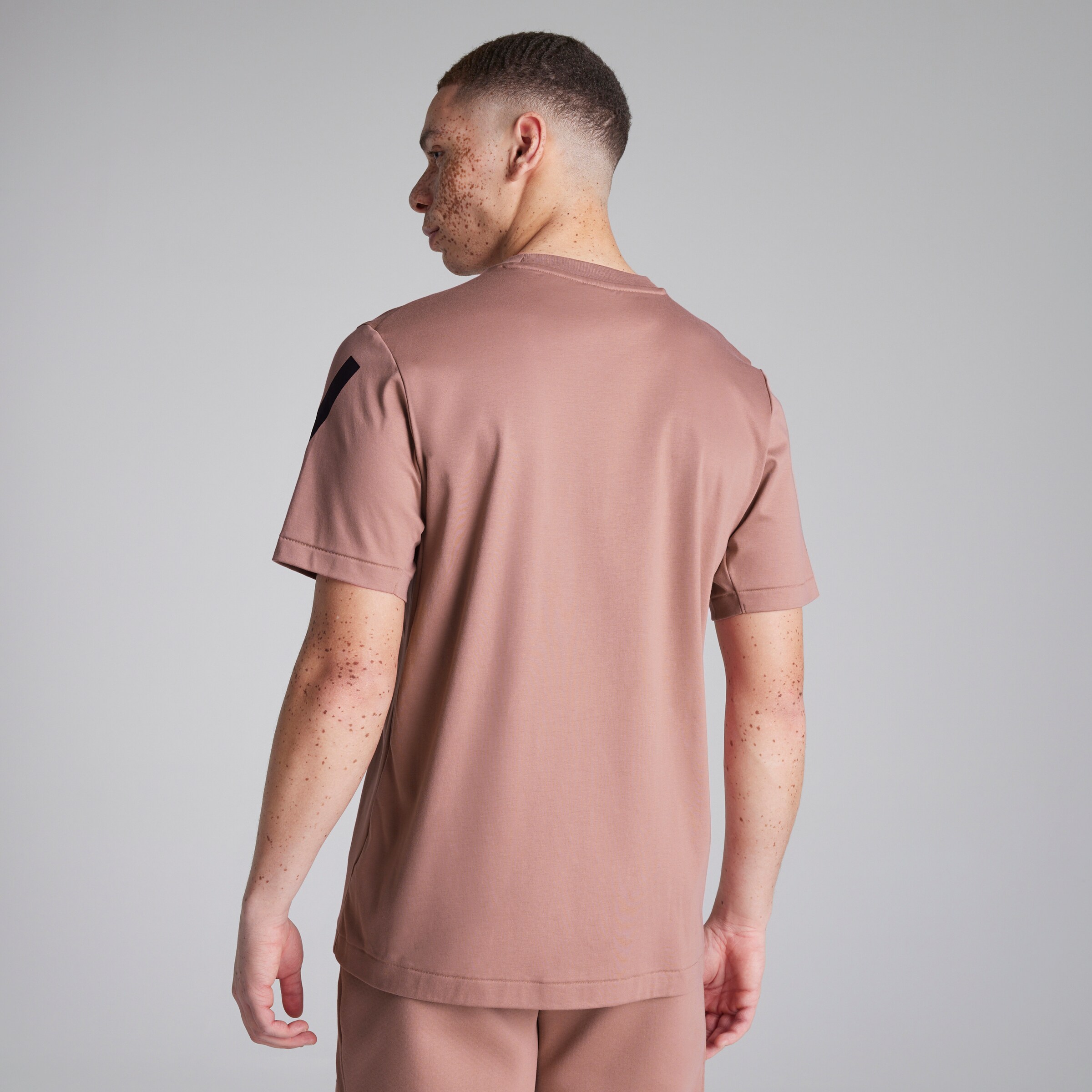 Buy Manchester United x adidas Z.N.E. T-Shirt Pink