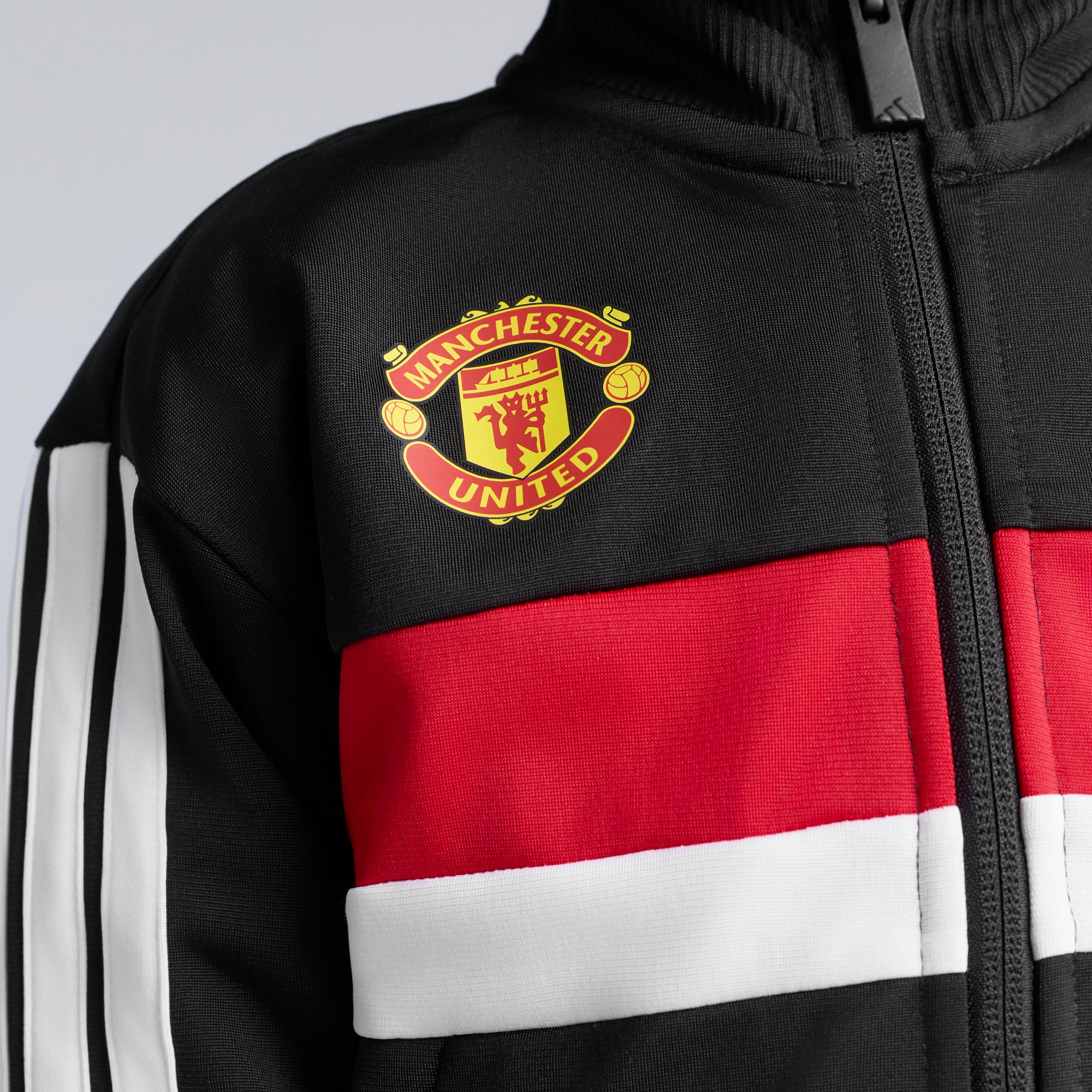 Manchester United x adidas Little Kids Essentials Tiberio 3-Stripes Tricot Tracksuit Black Black Detail [5-6]