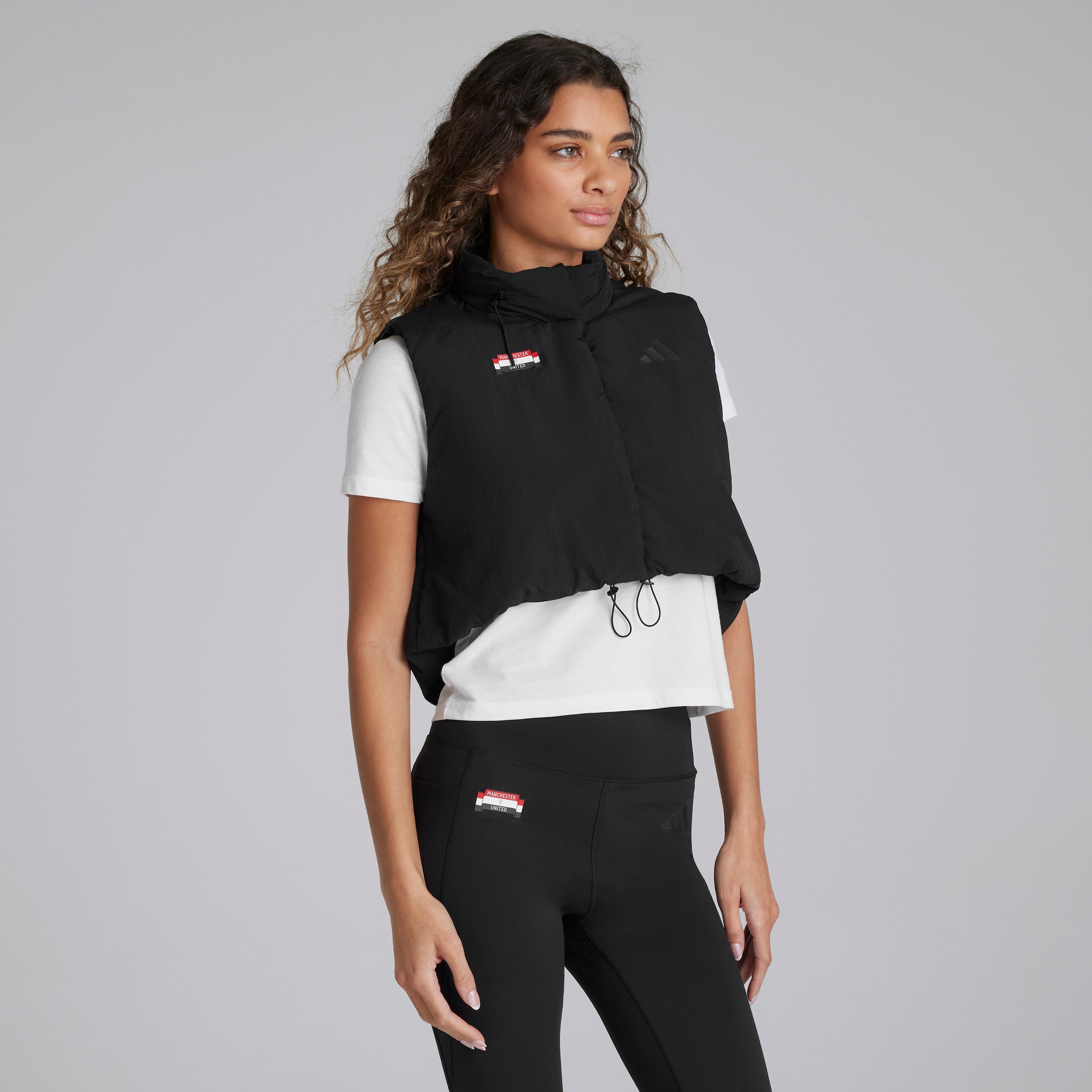 Manchester United x adidas Womens City Escape Cropped Gilet Black Black