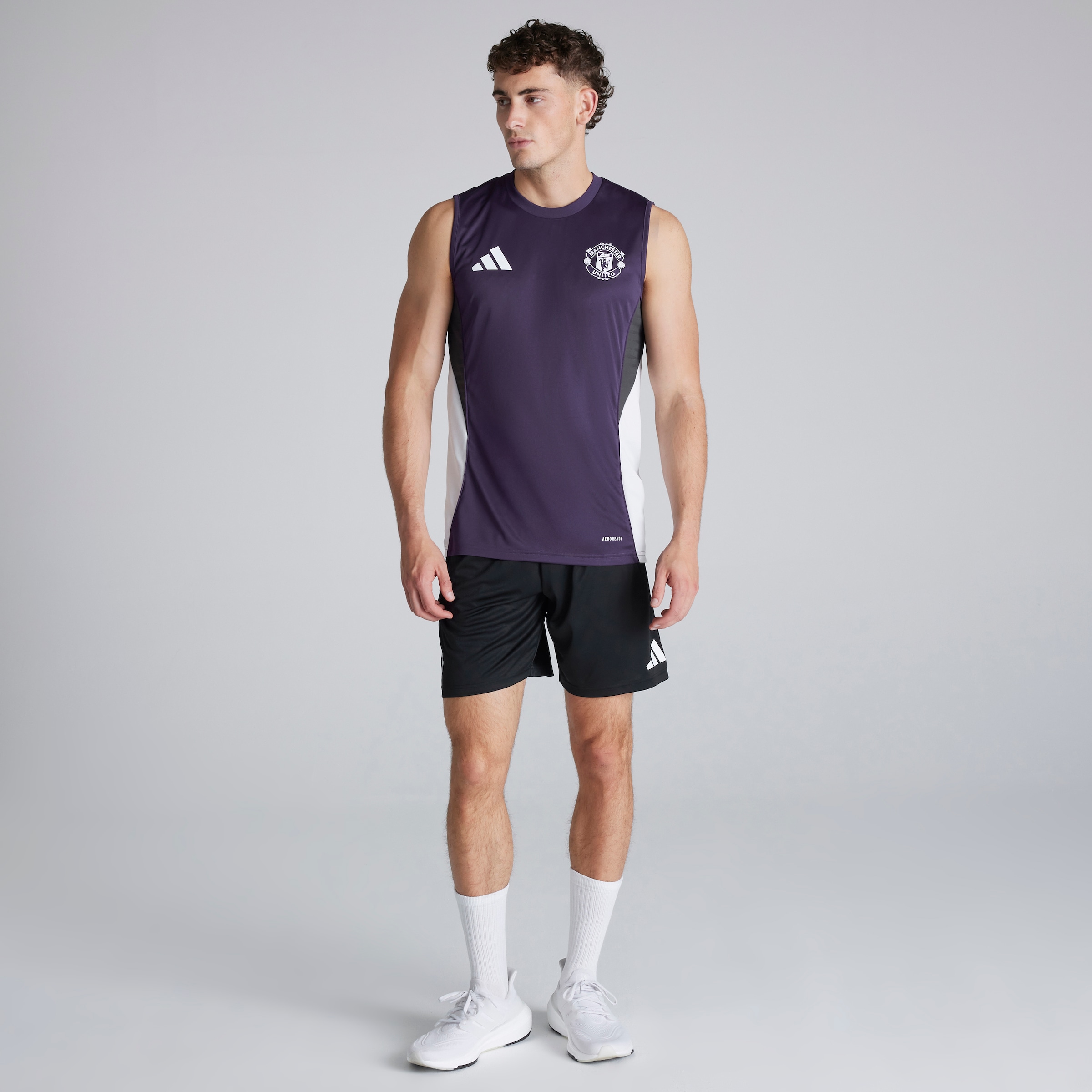 Buy Manchester United Tiro 25 Competition Sleeveless Jersey