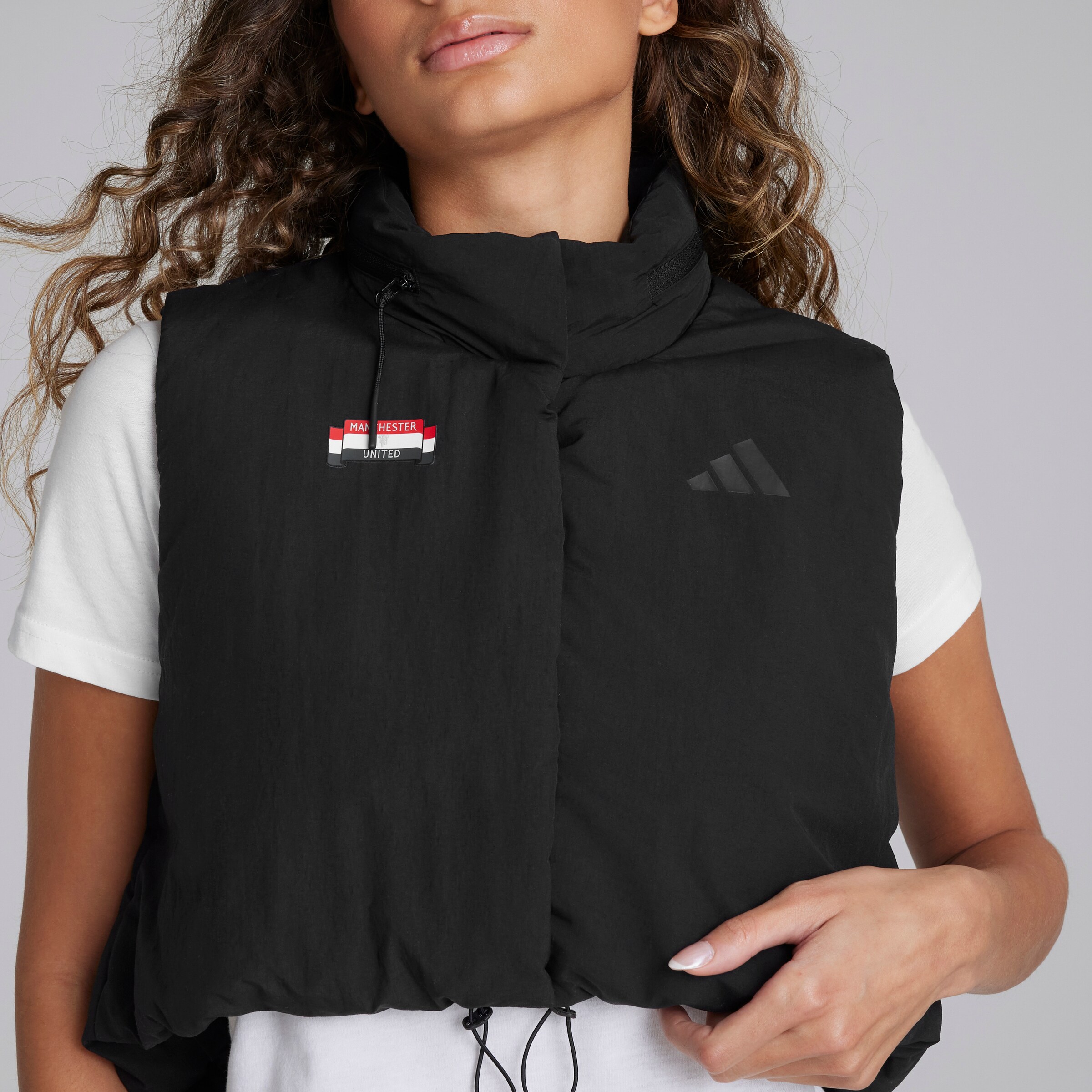 Manchester United x adidas Womens City Escape Cropped Gilet Black Black Detail [4-5]