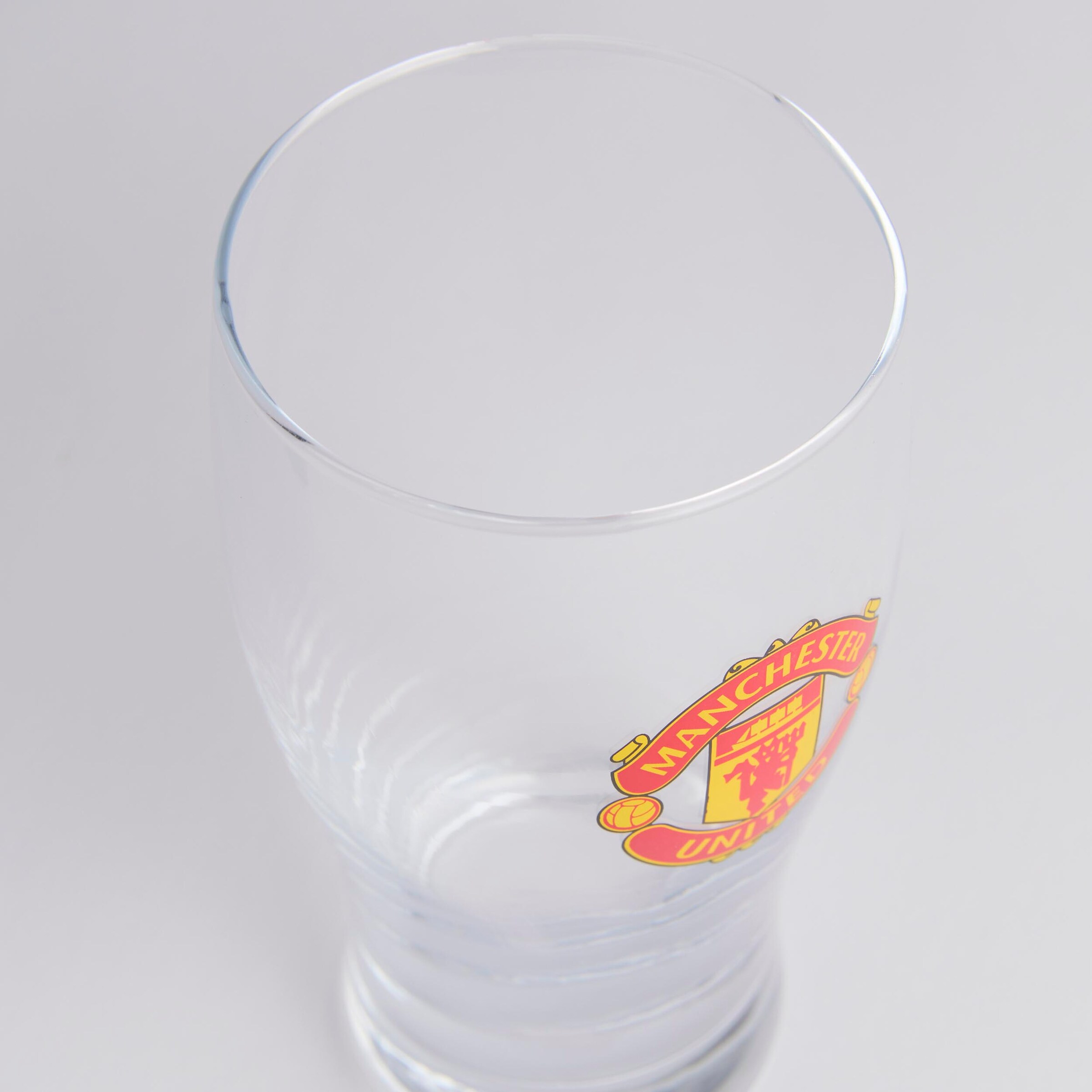 Buy Manchester United Tulip Pint Glass Clear | Manchester