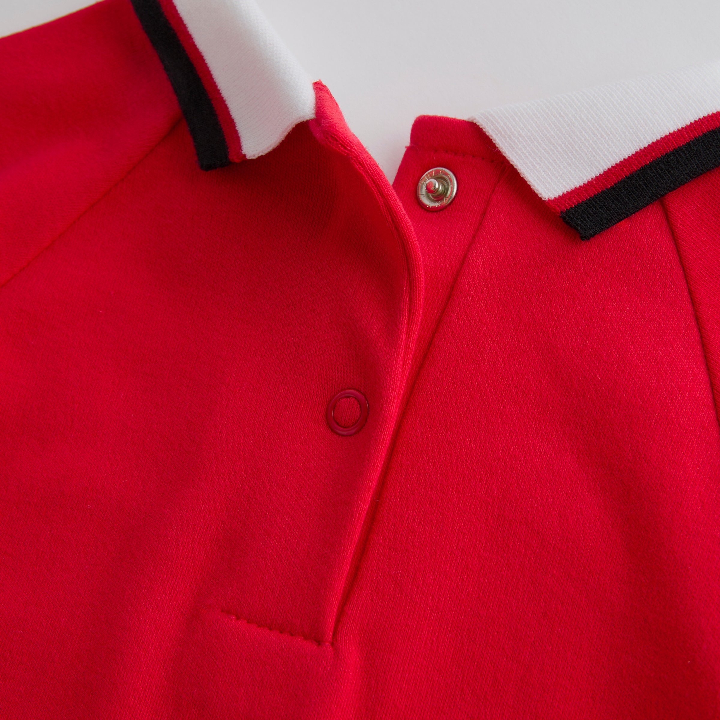 Manchester United Baby 1999 Retro Champions League Sleepsuit Red Red Detail [3-4]