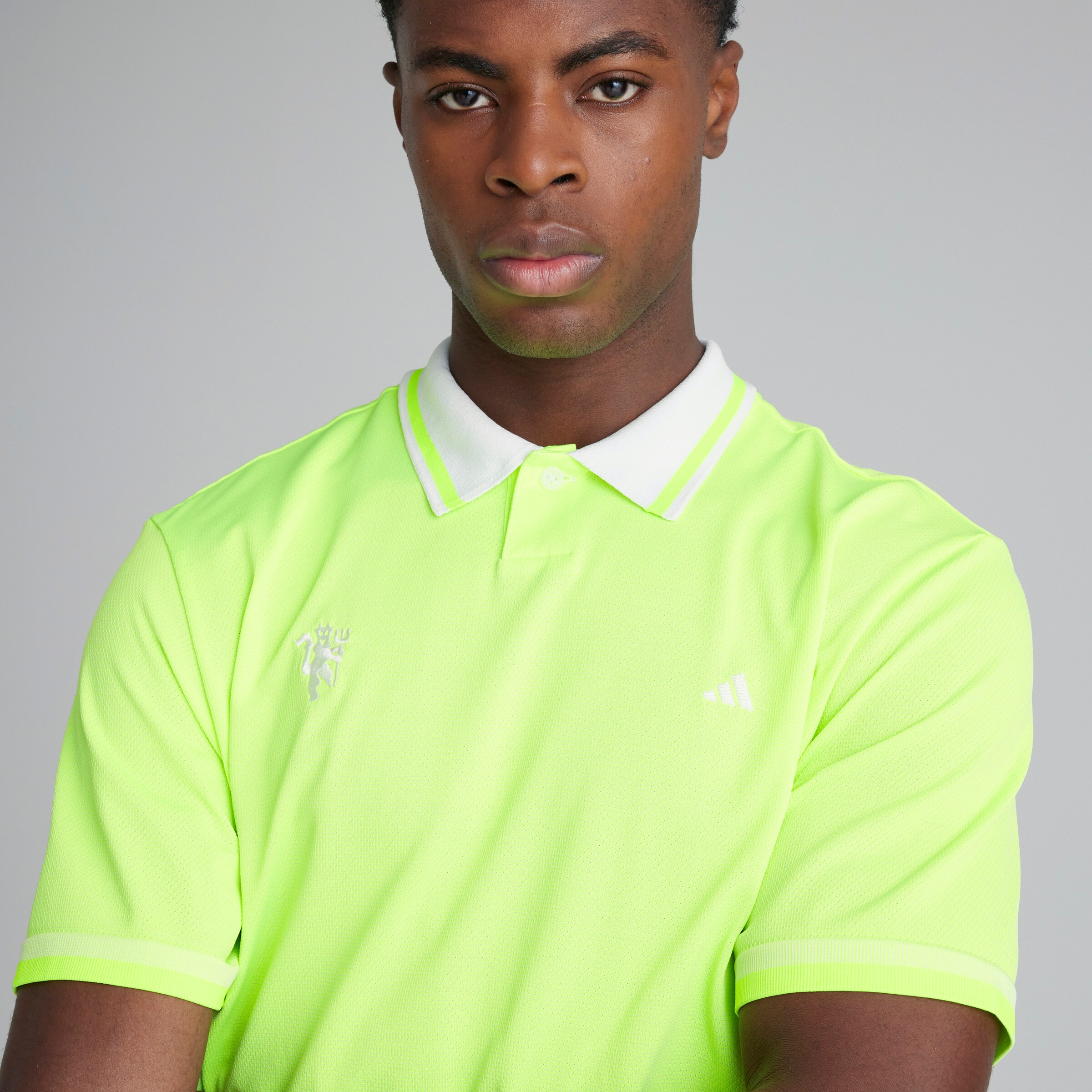 Manchester United x adidas Golf Primeknit Polo Shirt Yellow Detail [4-5]