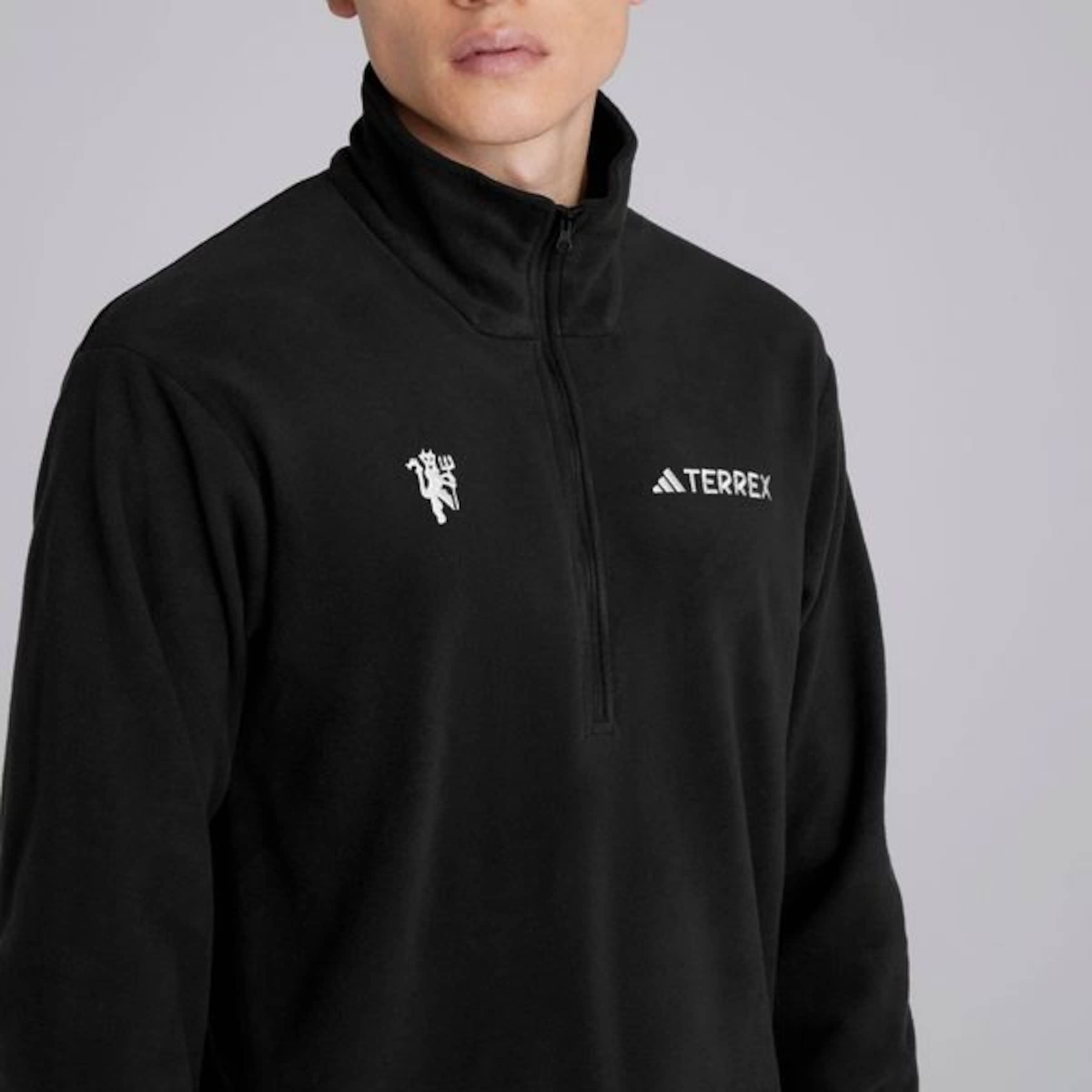 Buy Manchester United x adidas Terrex 1/2 Zip Fleece Jacket