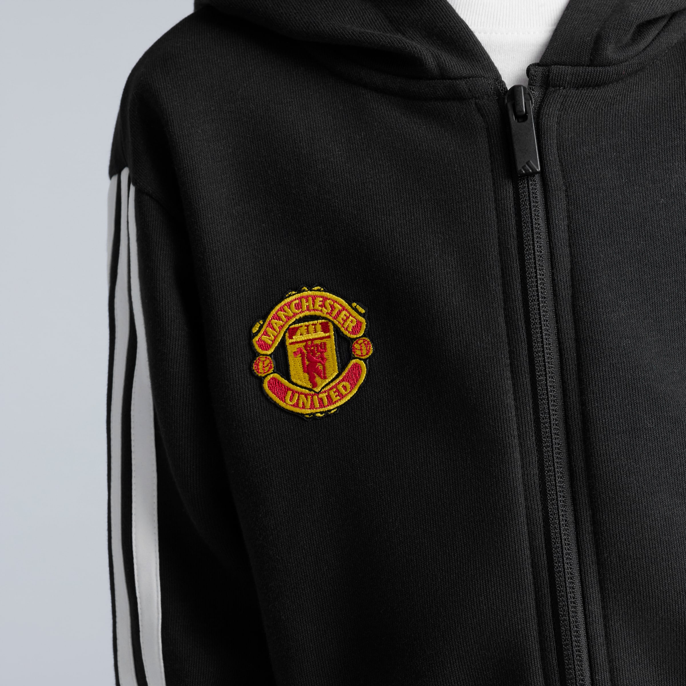 Manchester United x adidas Kids Essentials French Terry Tracksuit Black Black Detail [5-6]