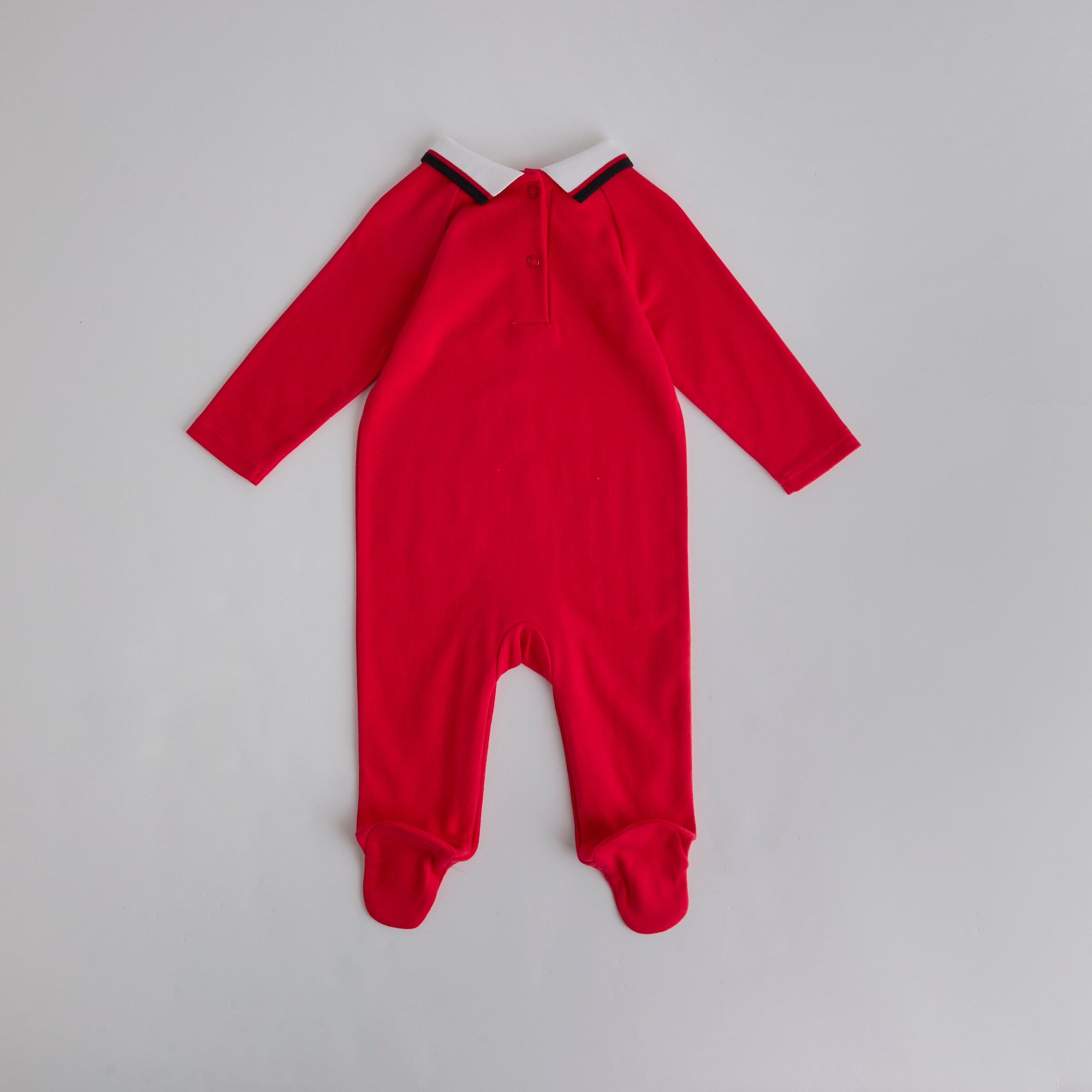 Manchester United Baby 1999 Retro Champions League Sleepsuit Red Red Detail [2-4]