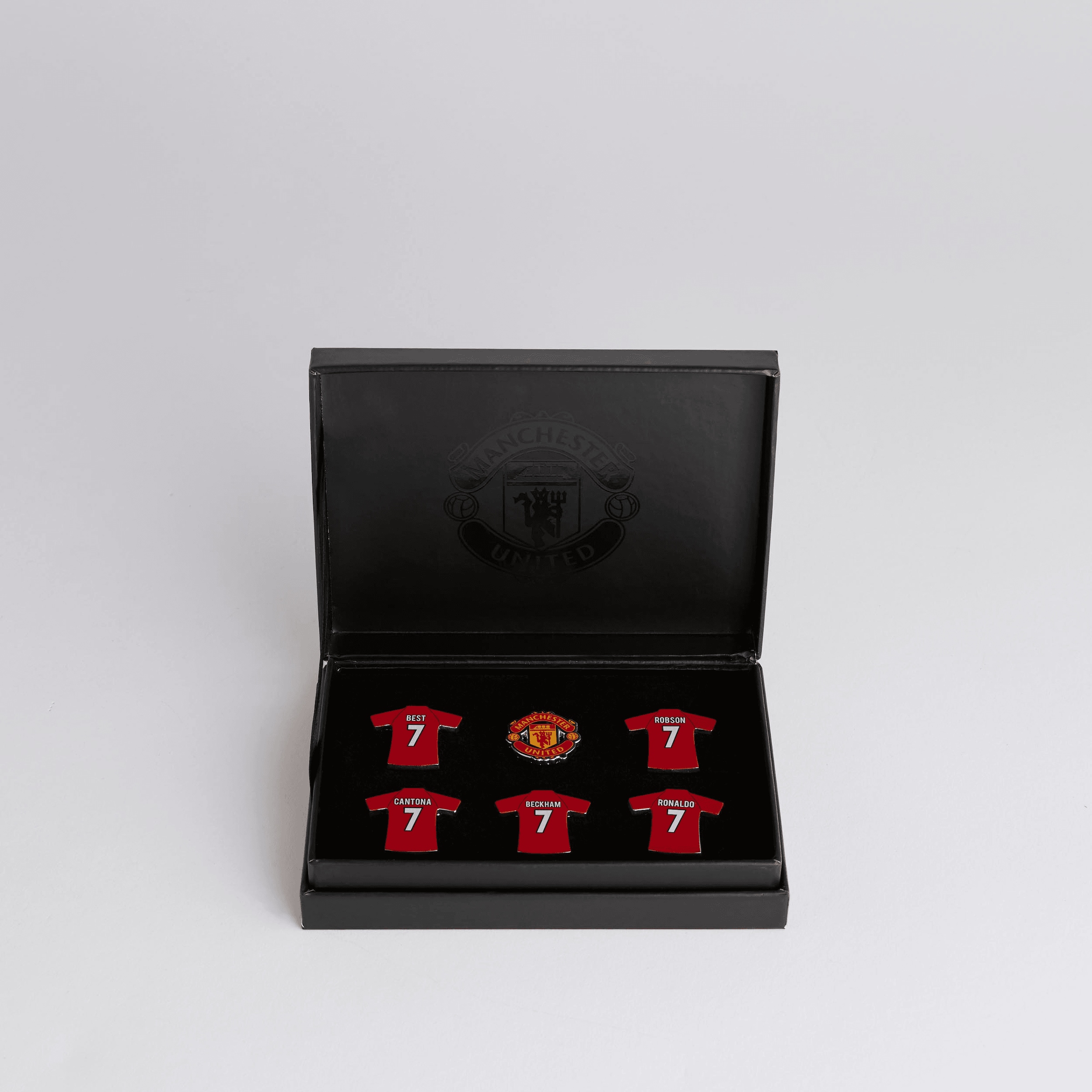 Buy Manchester United Number 7 Badge Set Red | Manchester United Store