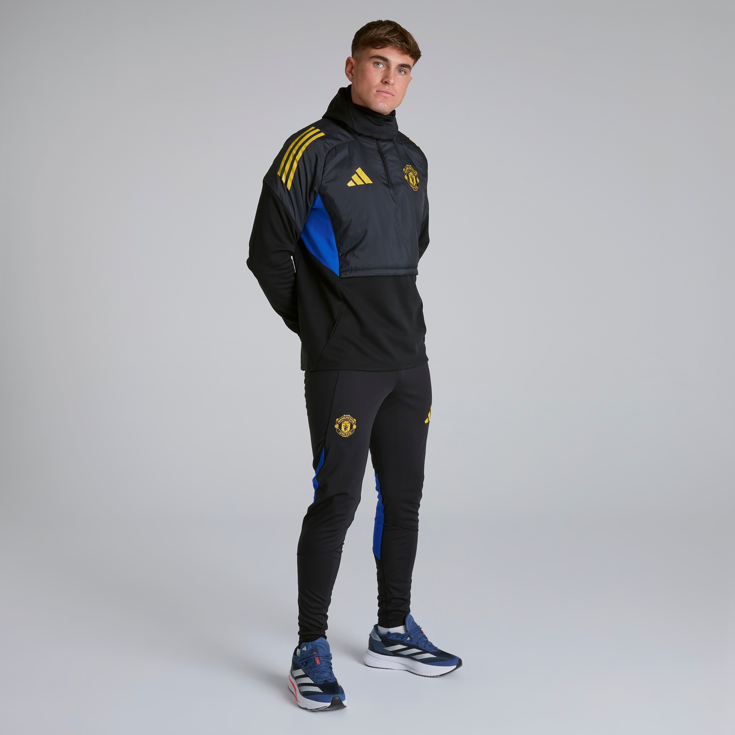 Manchester United Tiro 25 Competition Winterized Top Negro Detalle [3-6]