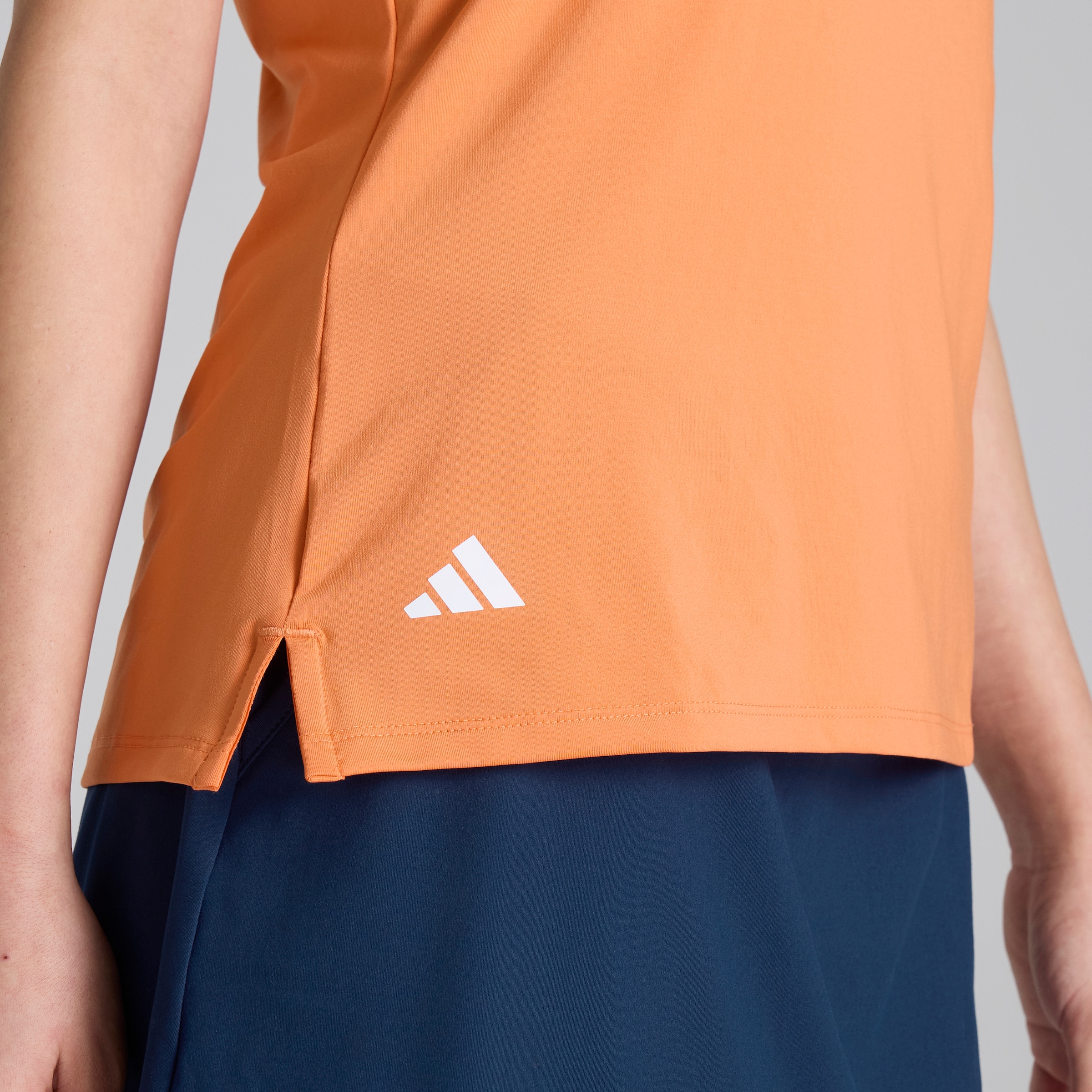 Manchester United x adidas Womens Golf Ultimate365 Polo Shirt Orange Orange Detail [4-6]