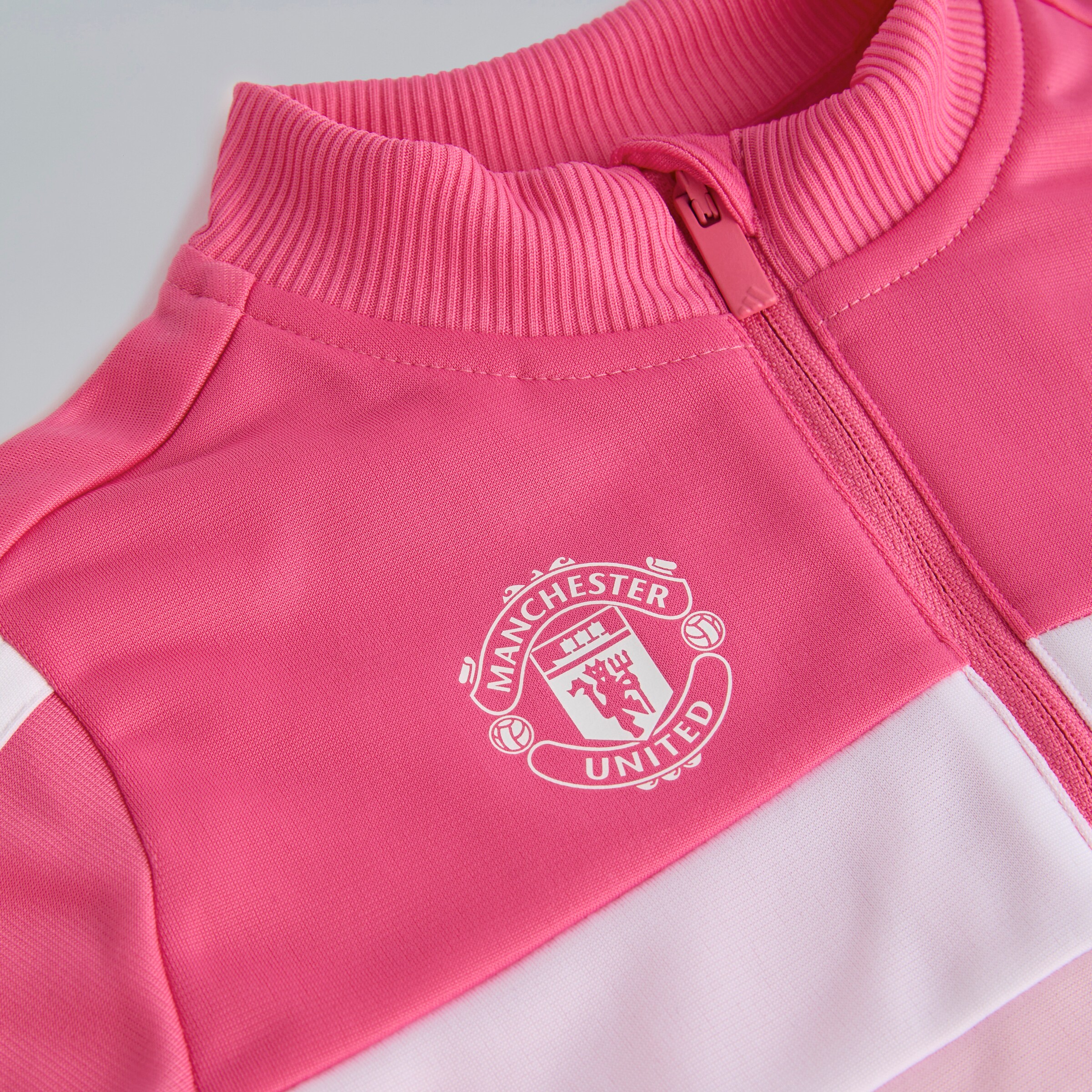 Manchester United x adidas Infant Essentials Tiberio 3-Stripes Tracksuit Pink Pink Detail [4-4]