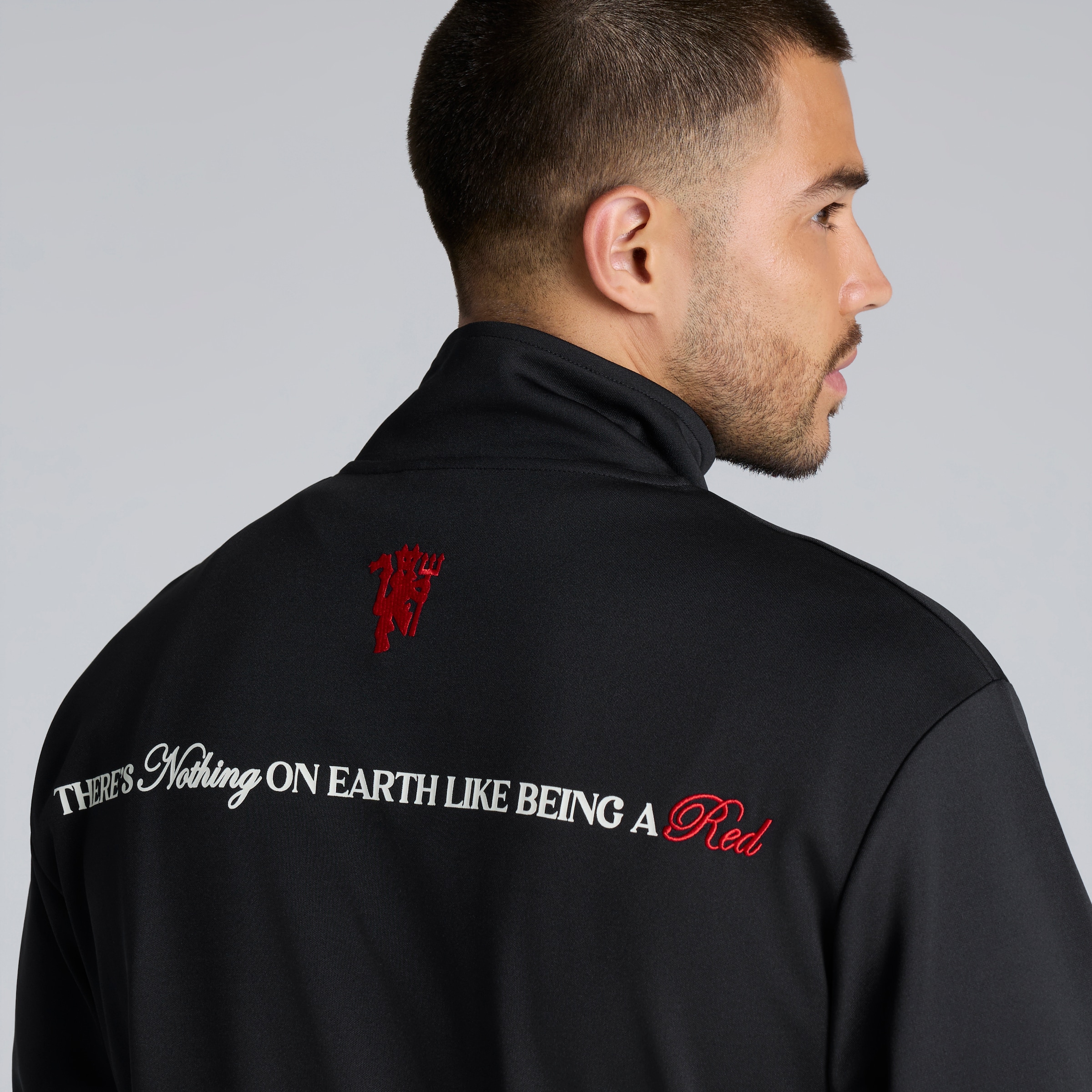 Manchester United There's Nothing on Earth Like Being a Red Track Jacket Black Negro Detalle [5-5]