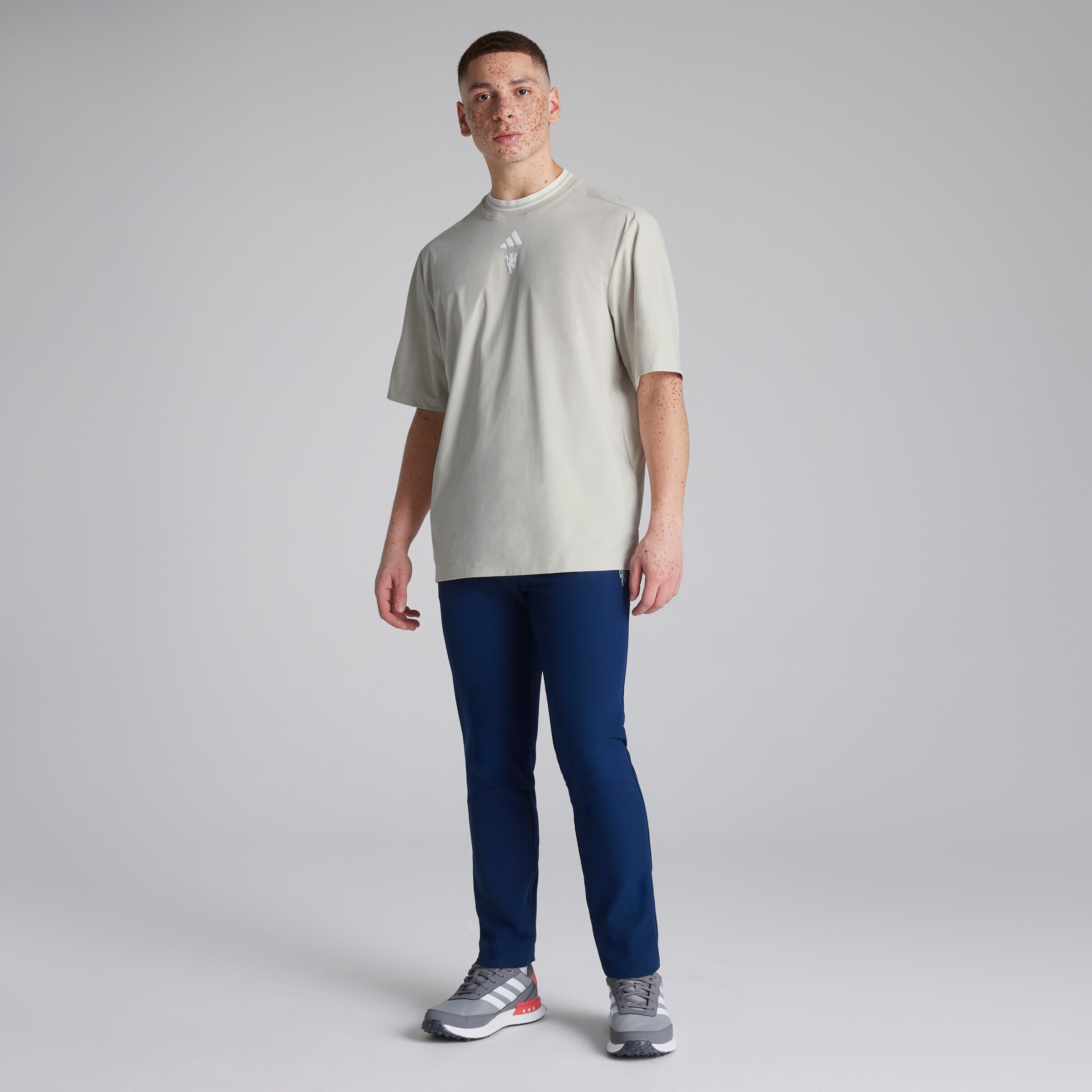 Manchester United x adidas Golf Beyond Mock Polo Shirt Beige Detail [3-5]